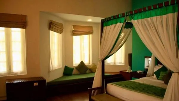 Bed in Old Lighthouse Bristow Hotel , Fort Kochi
