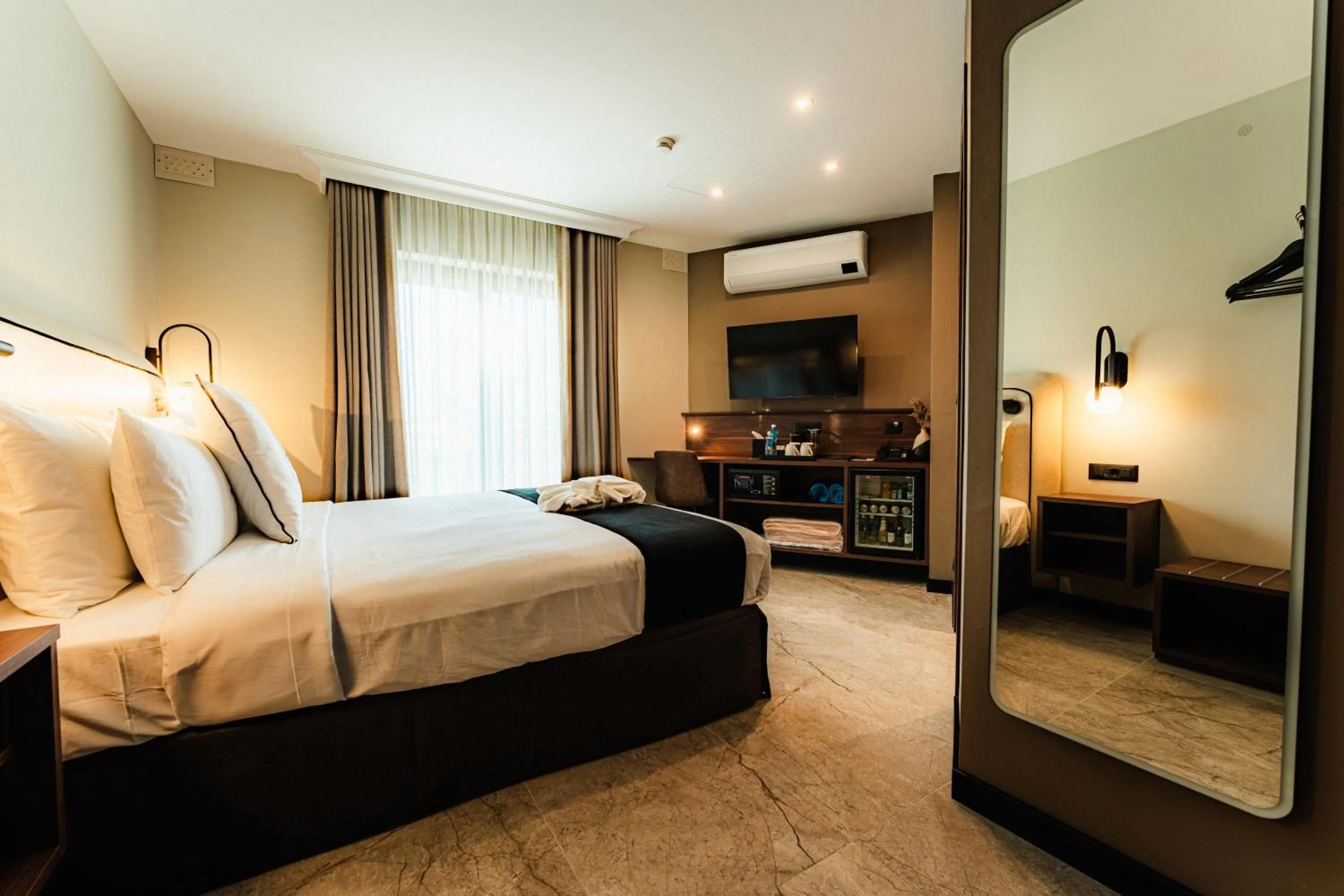 Bed in Royale Sainte Hélène Boutique Hotel