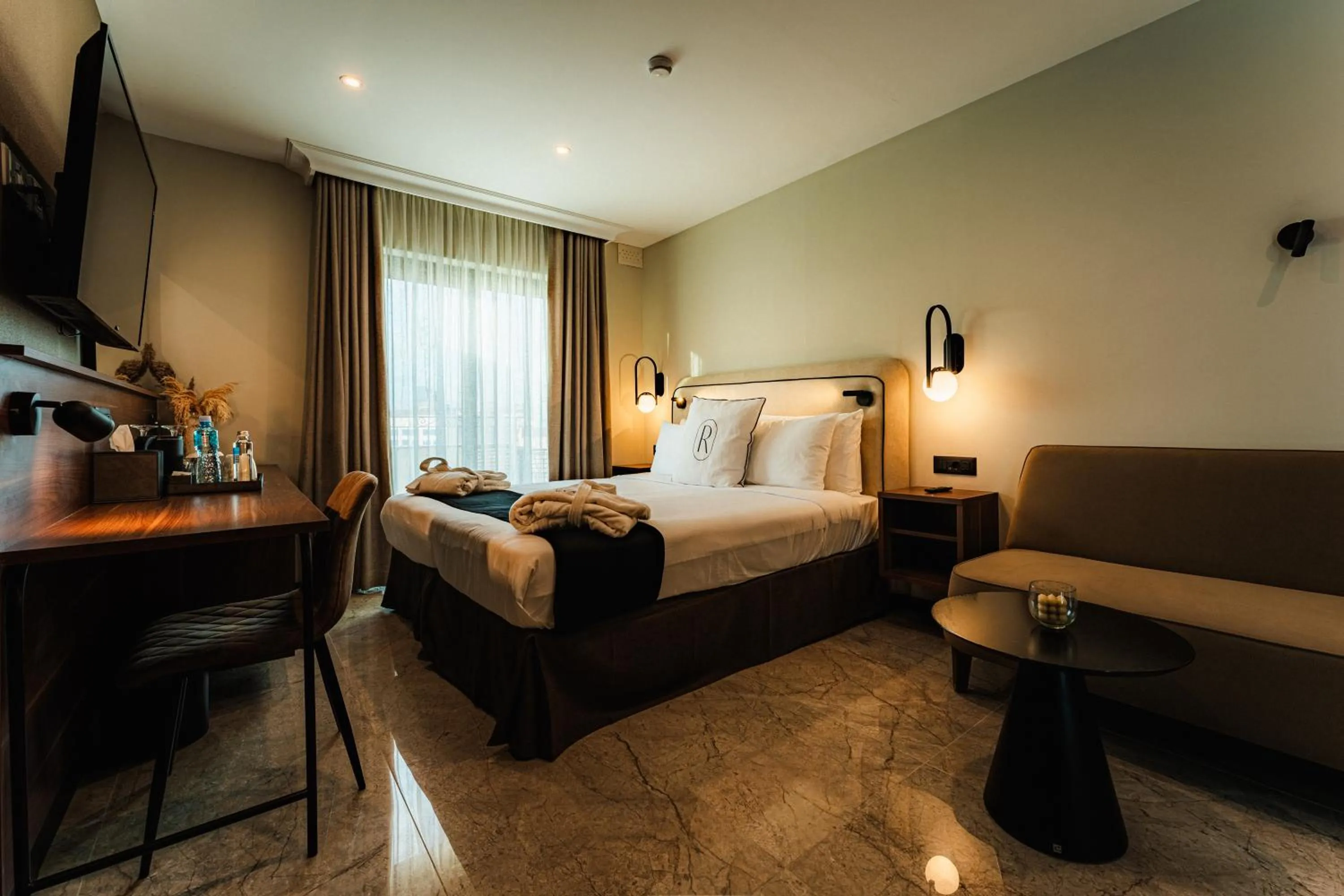 Bed in Royale Sainte Hélène Boutique Hotel