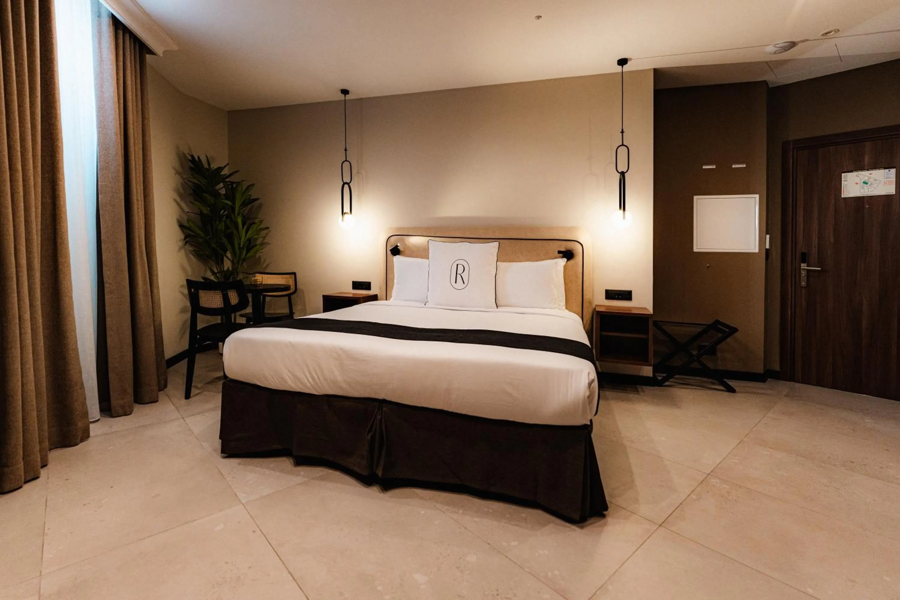 Bed in Royale Sainte Hélène Boutique Hotel