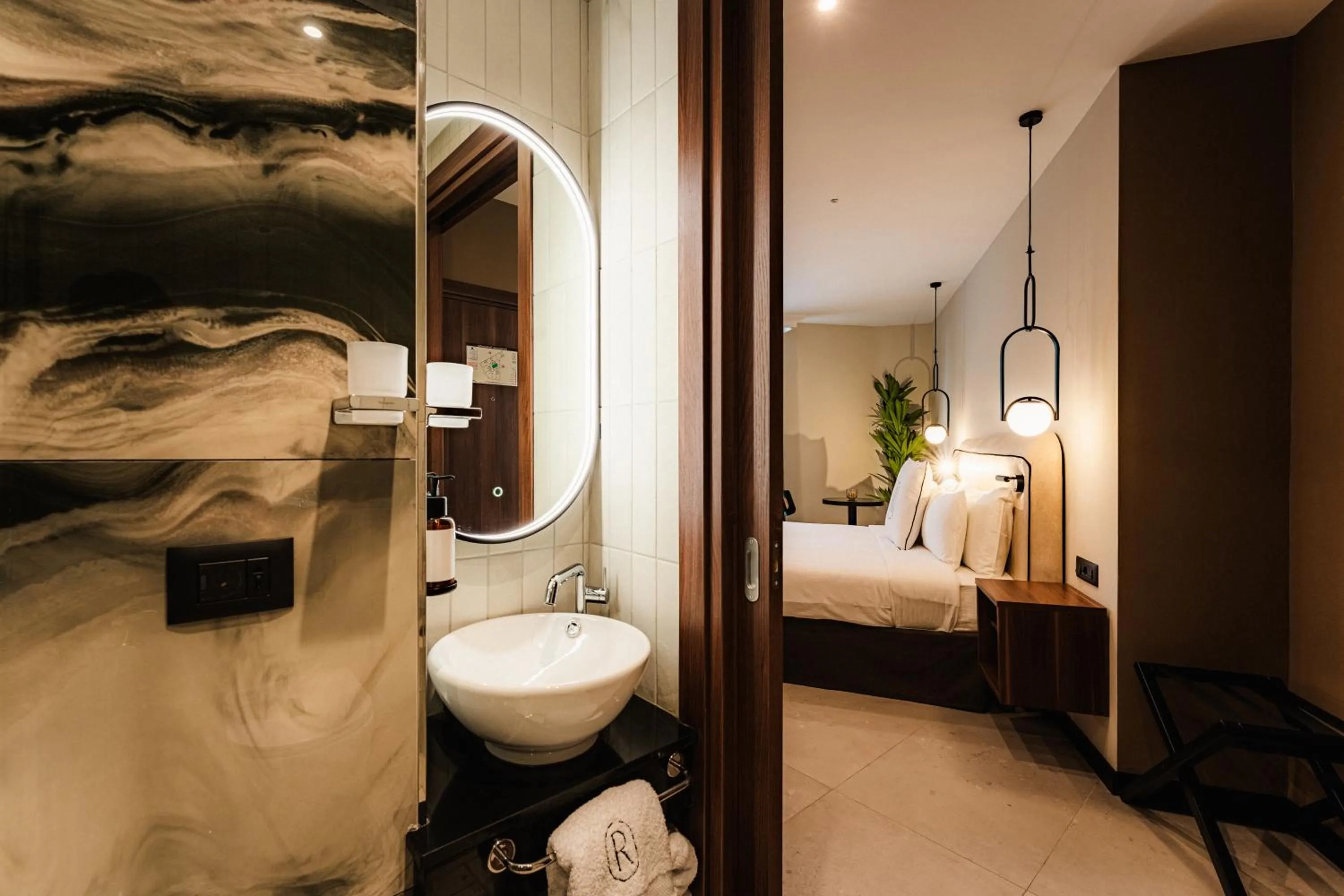 Bed in Royale Sainte Hélène Boutique Hotel