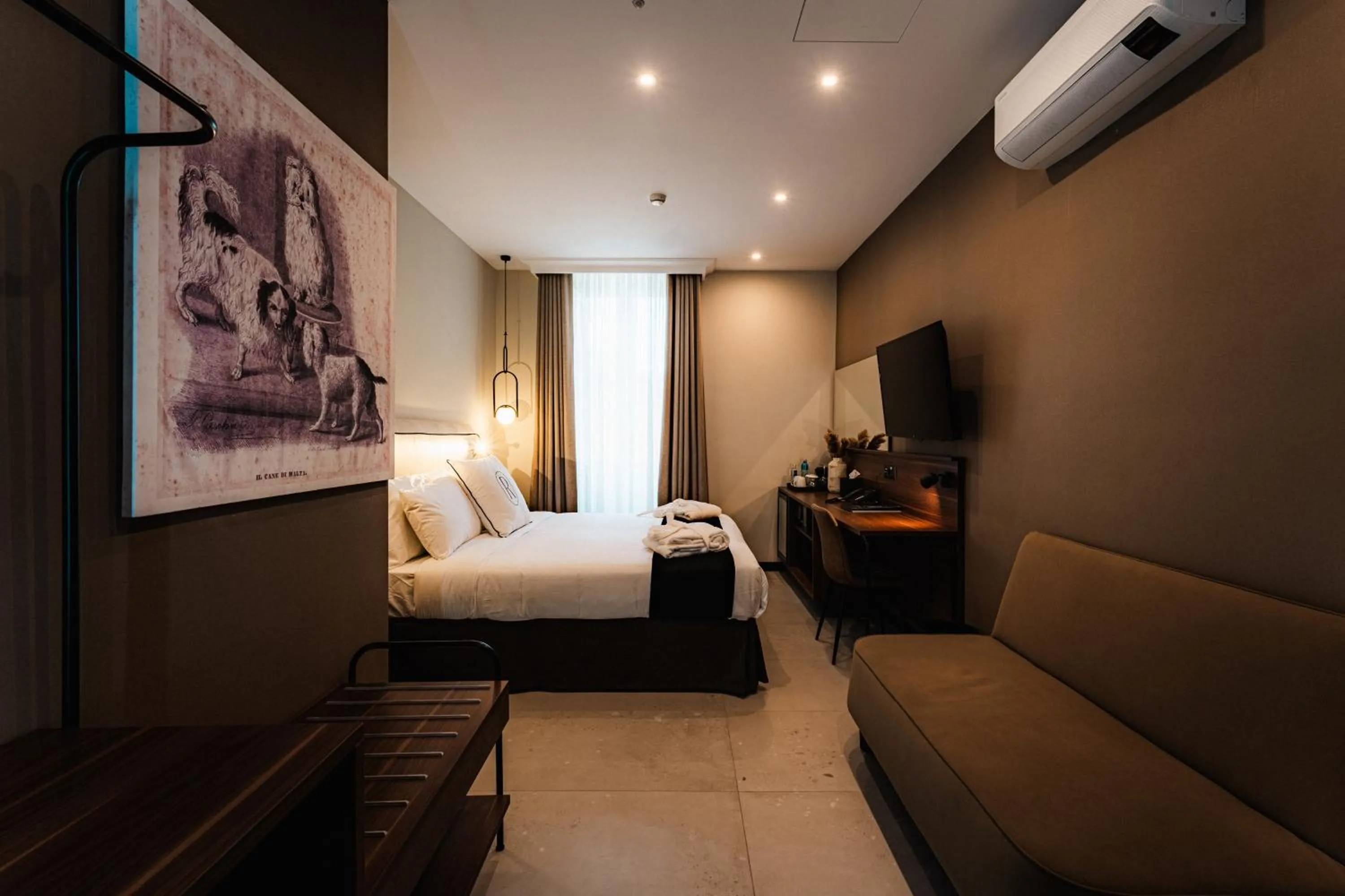 Bed in Royale Sainte Hélène Boutique Hotel