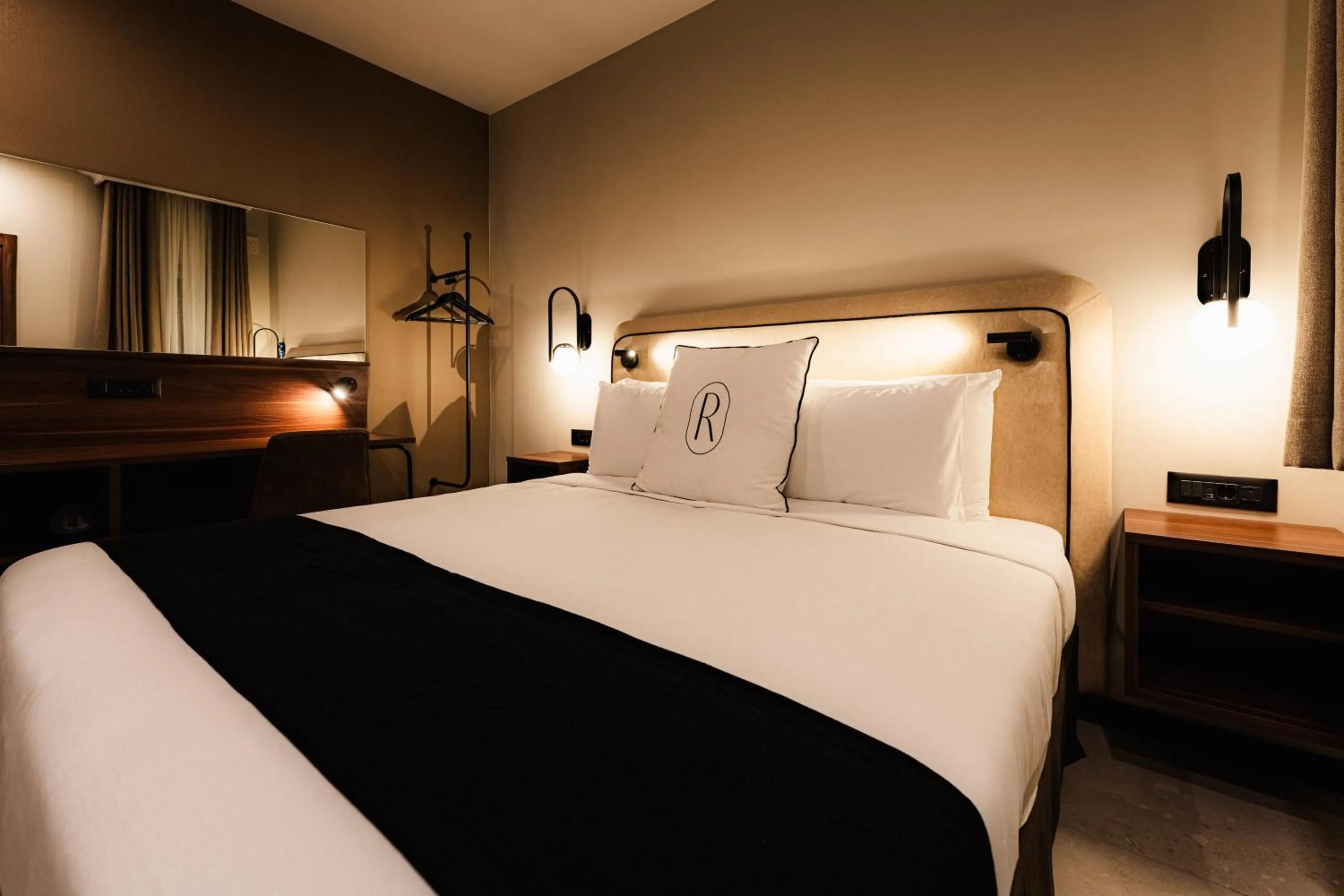 Bed in Royale Sainte Hélène Boutique Hotel