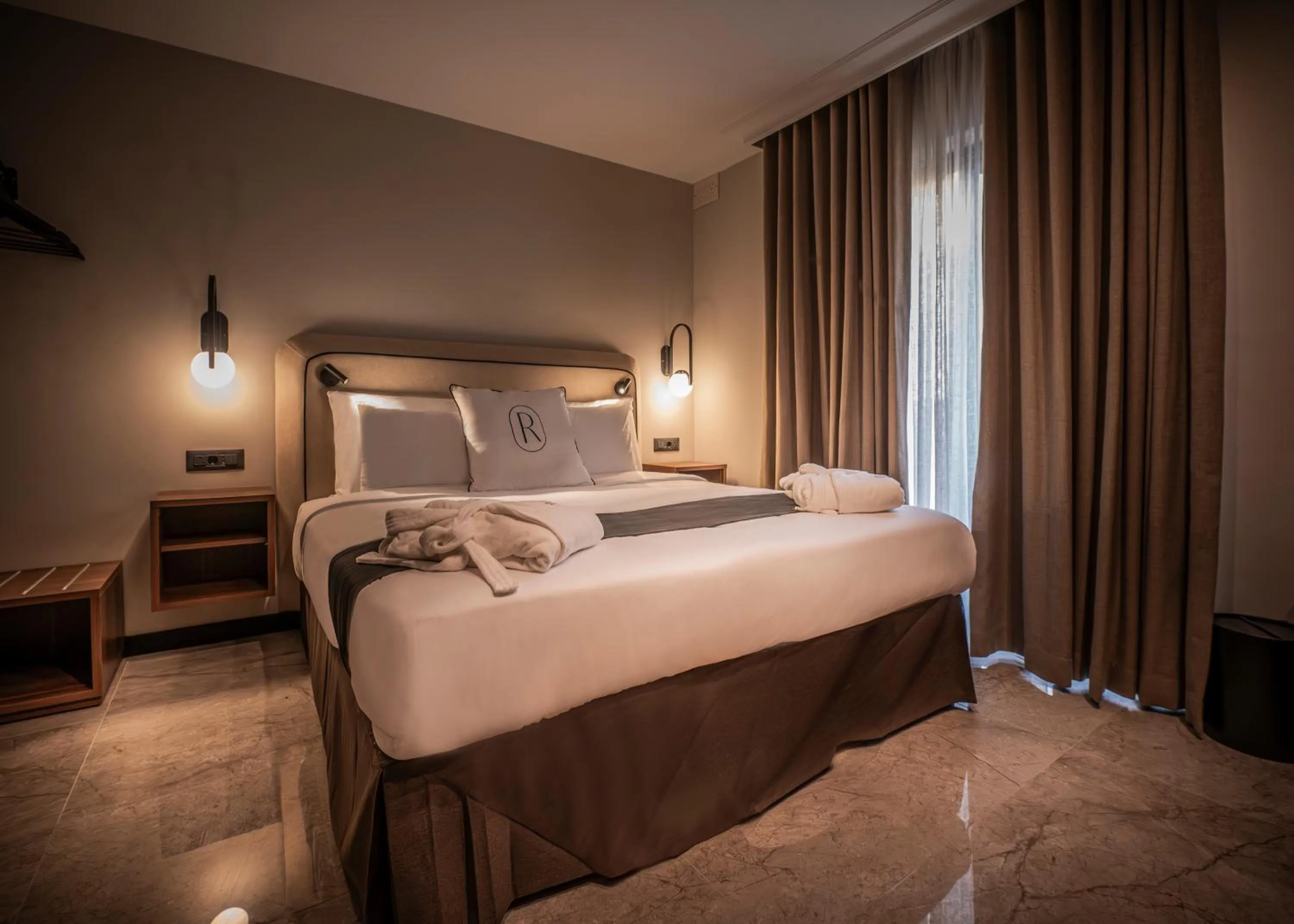 Bed in Royale Sainte Hélène Boutique Hotel