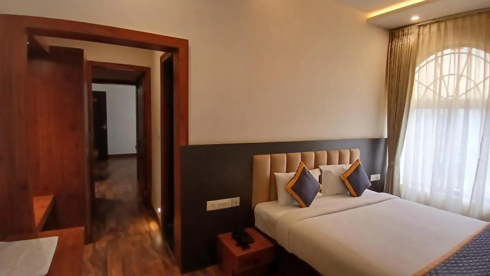 Bed in PPH Living Rajathagiri Palace Premium Rooms