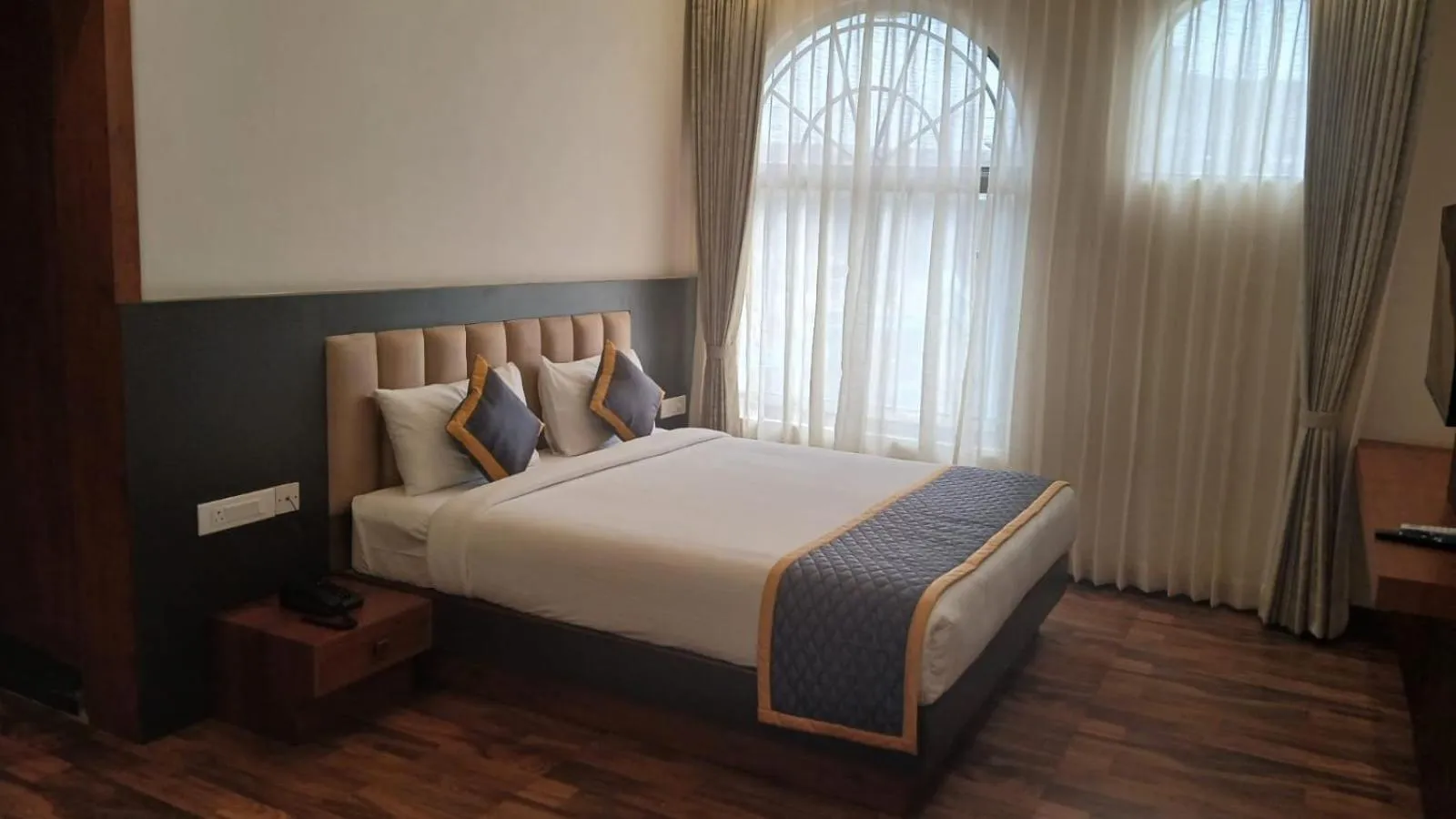 Bed in PPH Living Rajathagiri Palace Premium Rooms