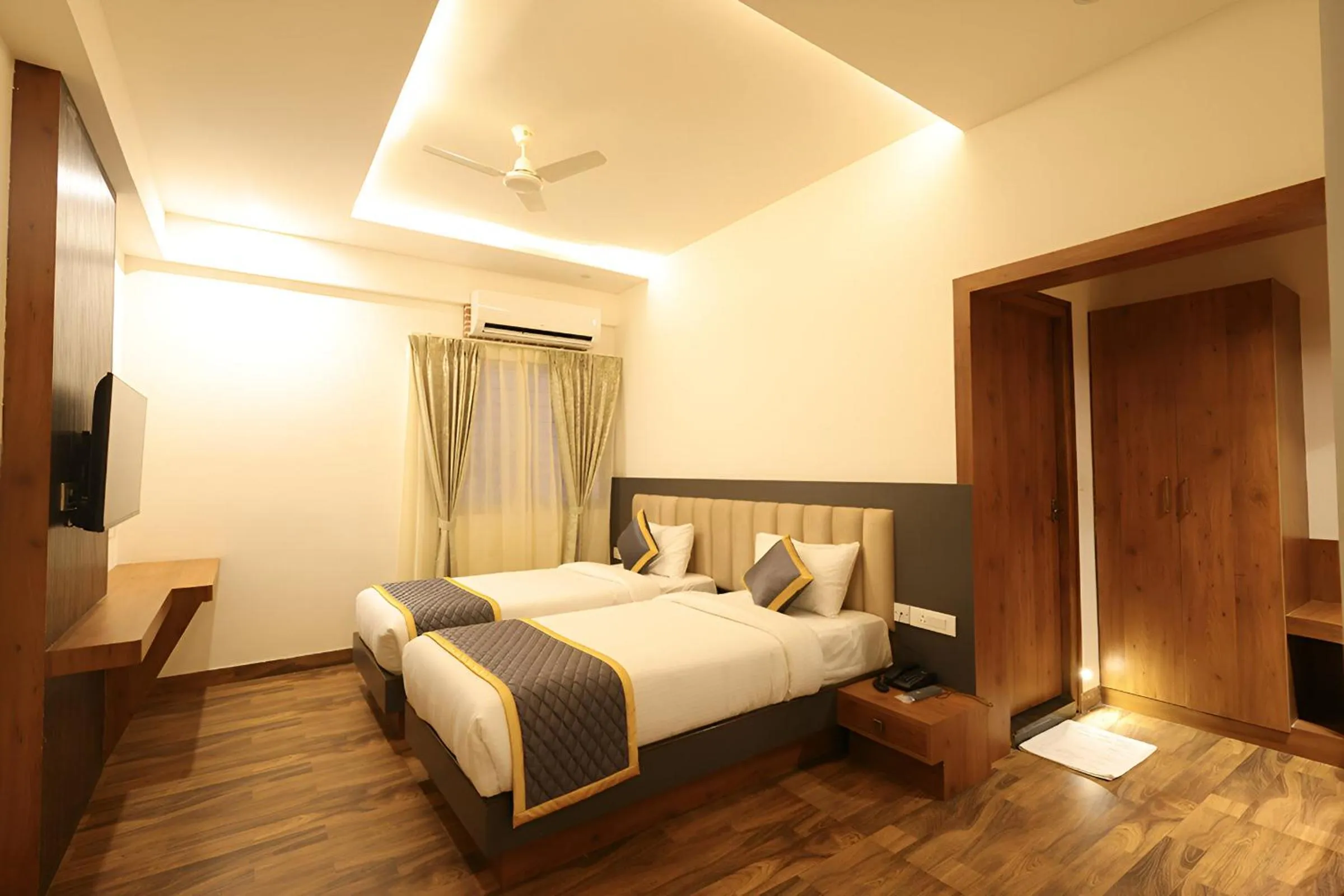 Bed in PPH Living Rajathagiri Palace Premium Rooms