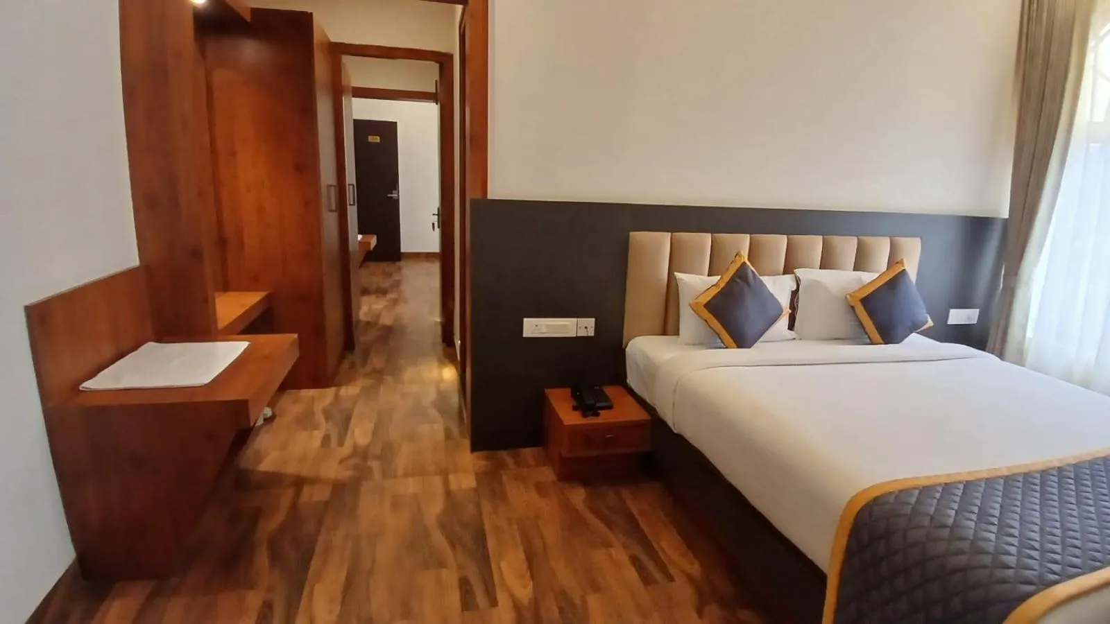 Bed in PPH Living Rajathagiri Palace Premium Rooms