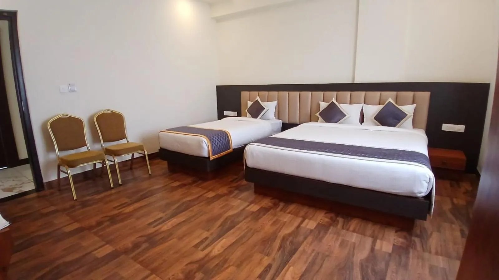 Bed in PPH Living Rajathagiri Palace Premium Rooms