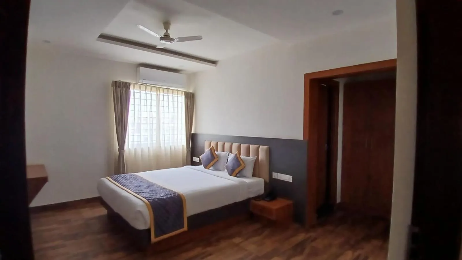 Bed in PPH Living Rajathagiri Palace Premium Rooms