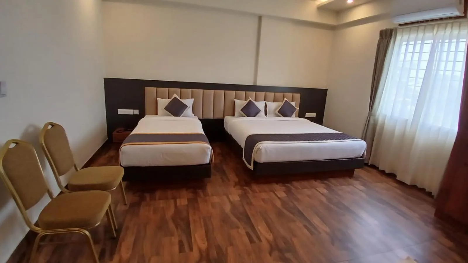 Bed in PPH Living Rajathagiri Palace Premium Rooms