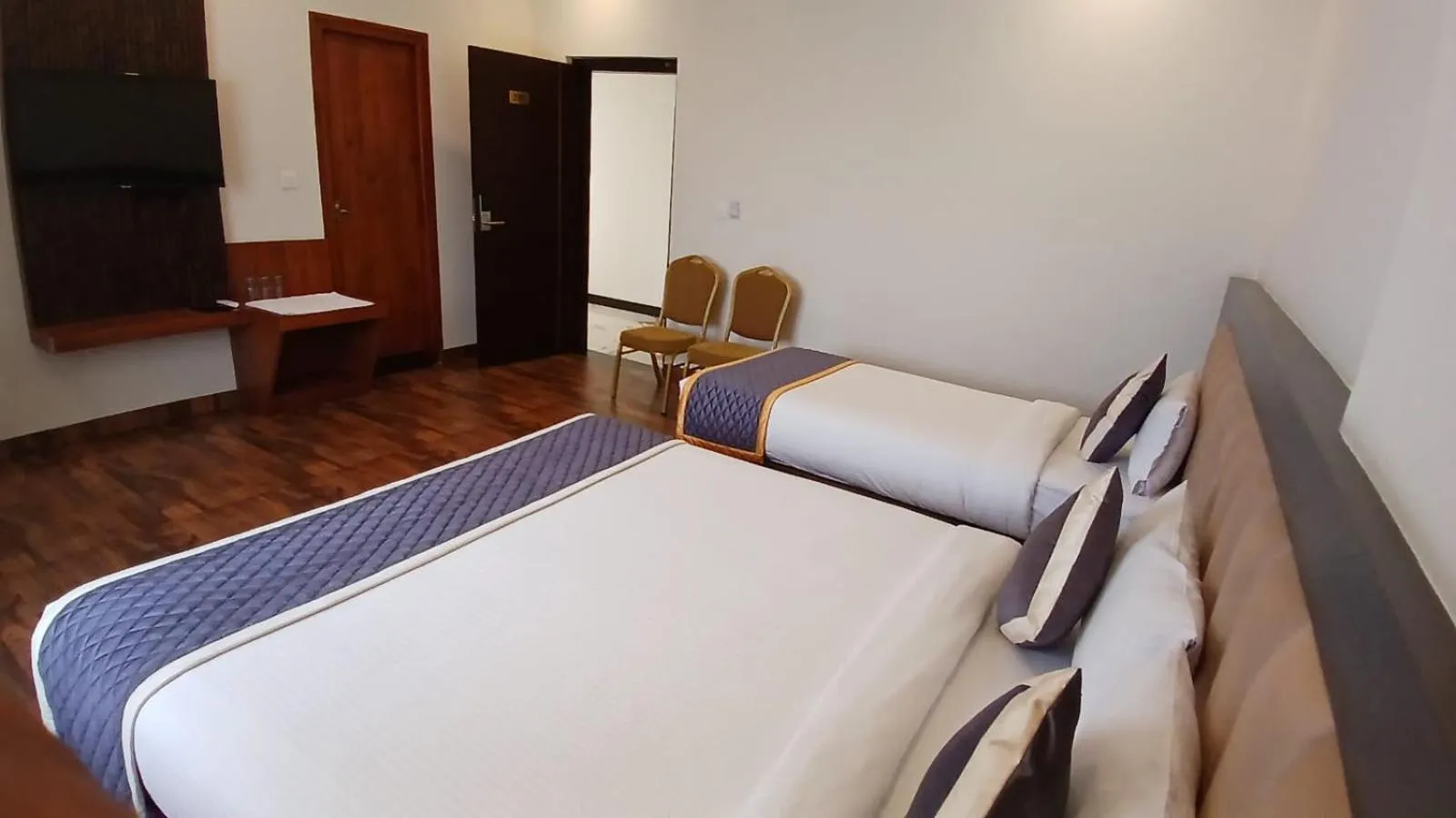 Bed in PPH Living Rajathagiri Palace Premium Rooms