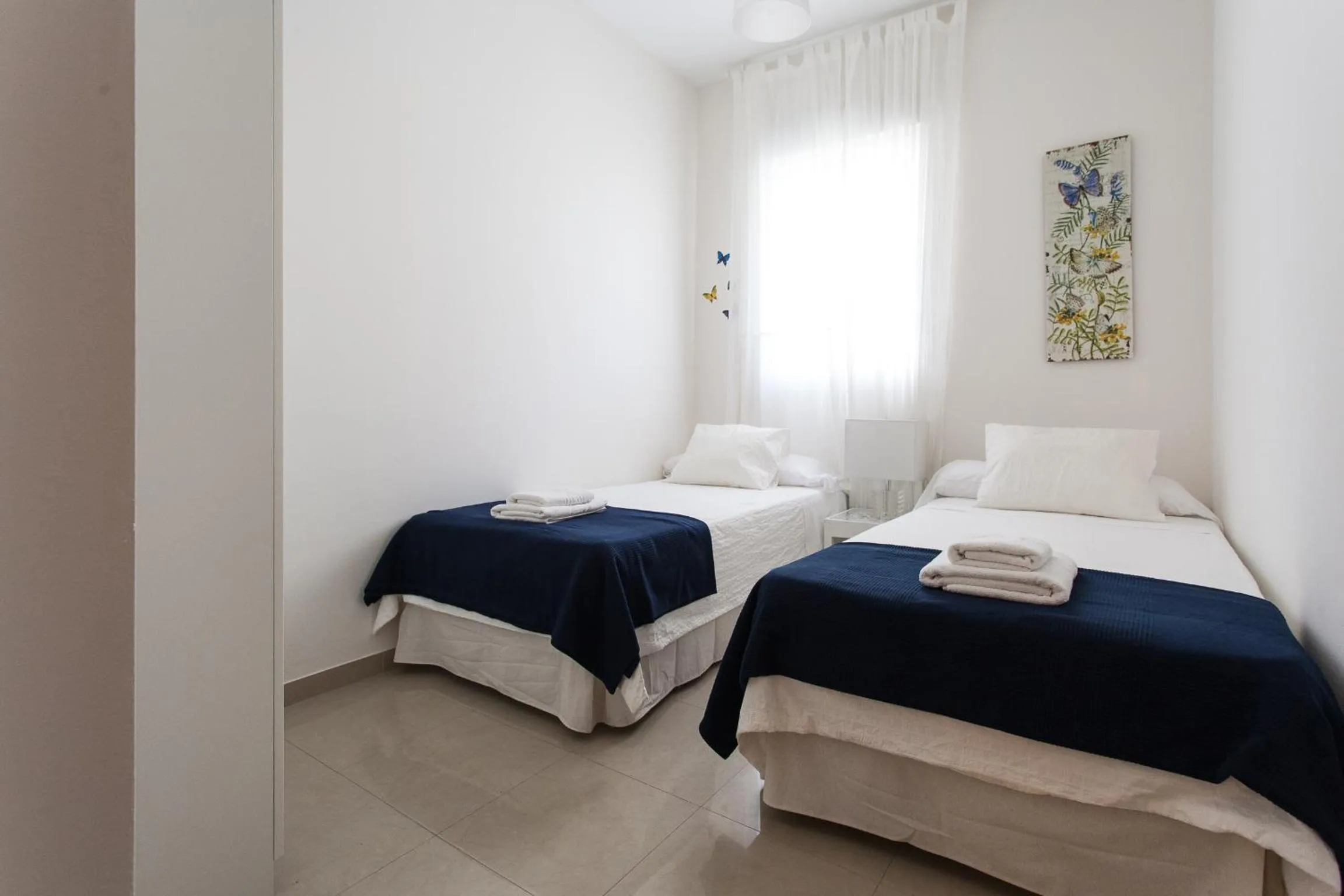 Bedroom, Bed in Apartamentos Diaber San Leandro