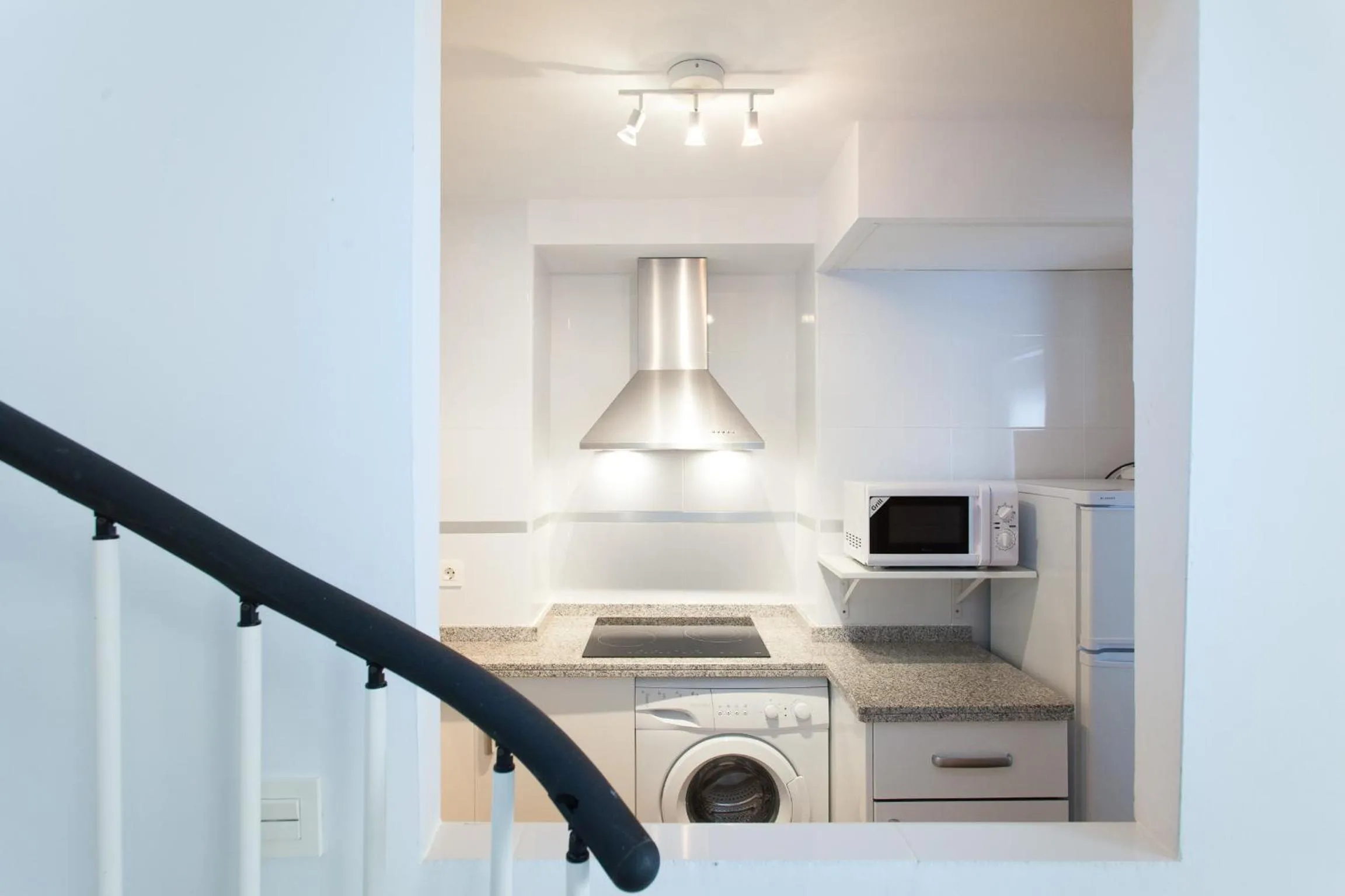Kitchen or kitchenette in Apartamentos Diaber San Leandro
