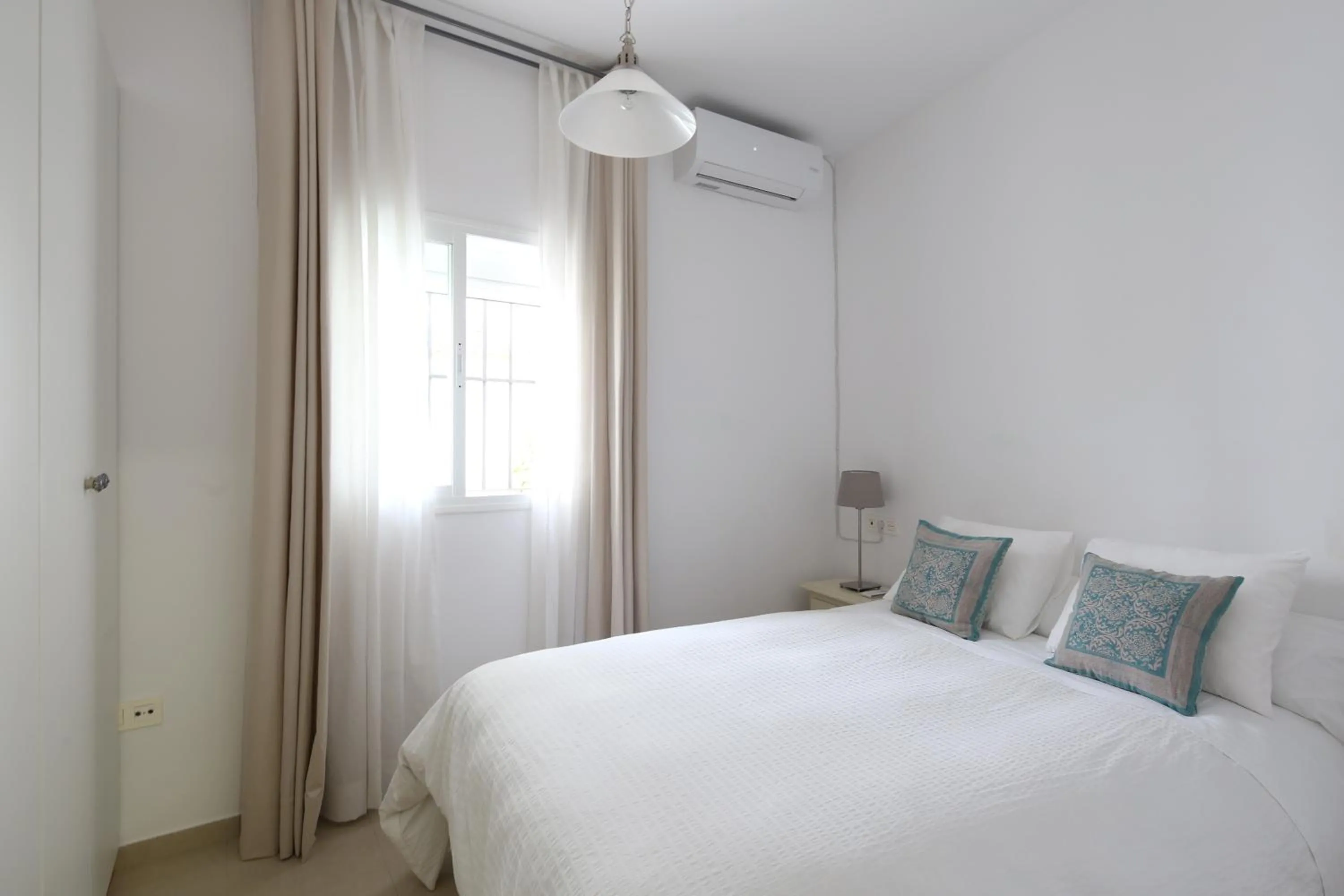 Bed in Apartamentos Diaber San Leandro