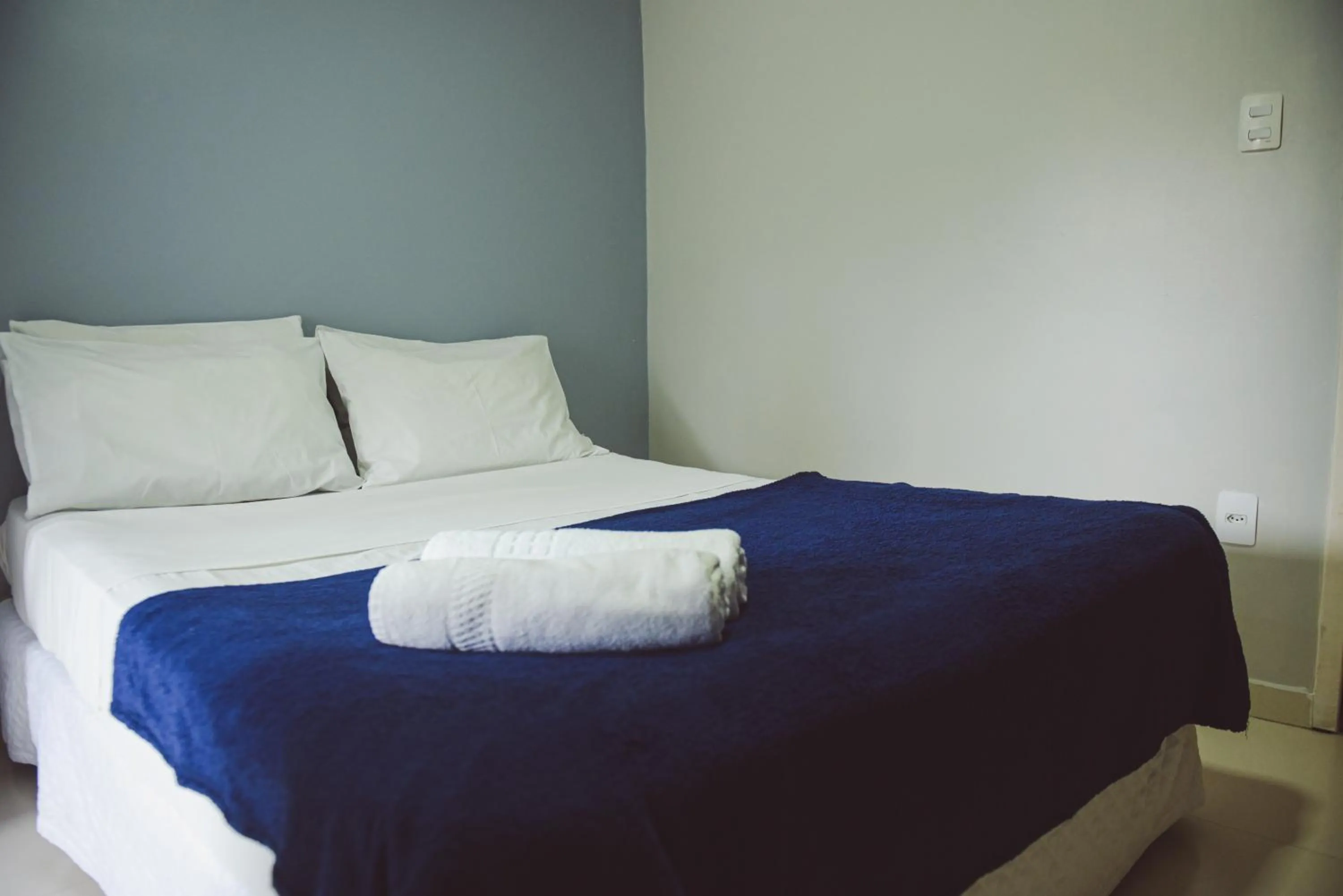 Bed in Pousada Xerxes