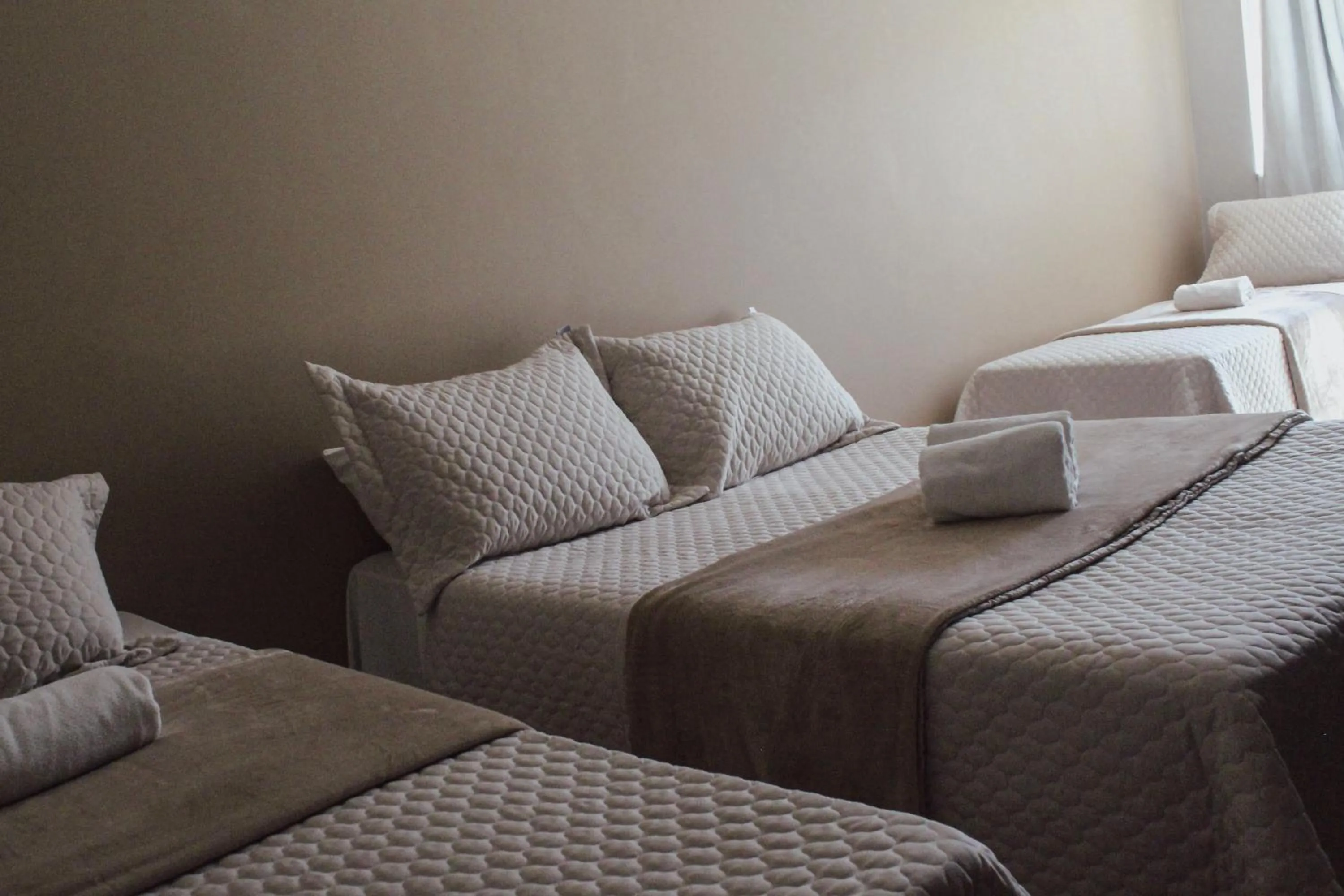 Bed in Pousada Xerxes