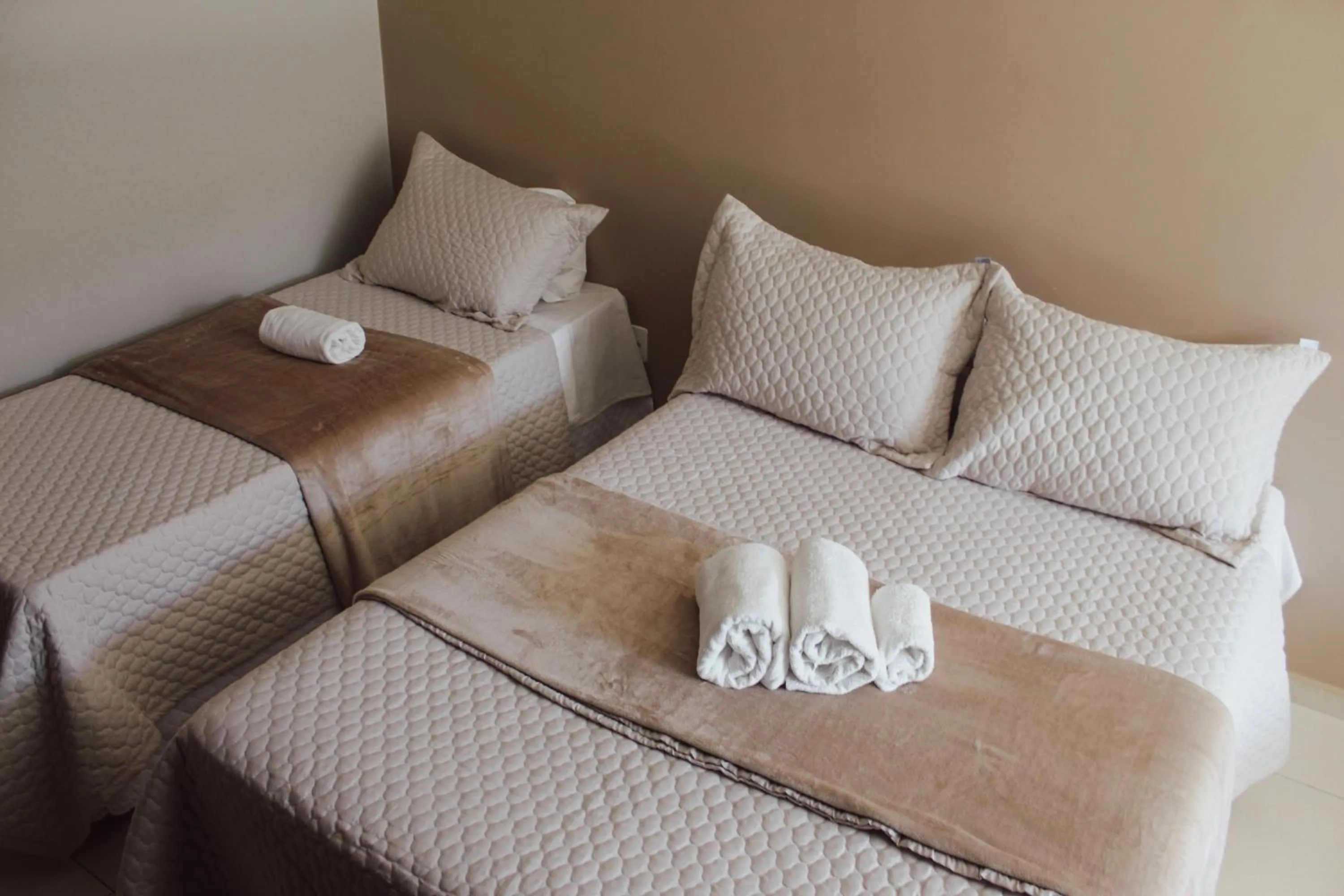 Bed in Pousada Xerxes