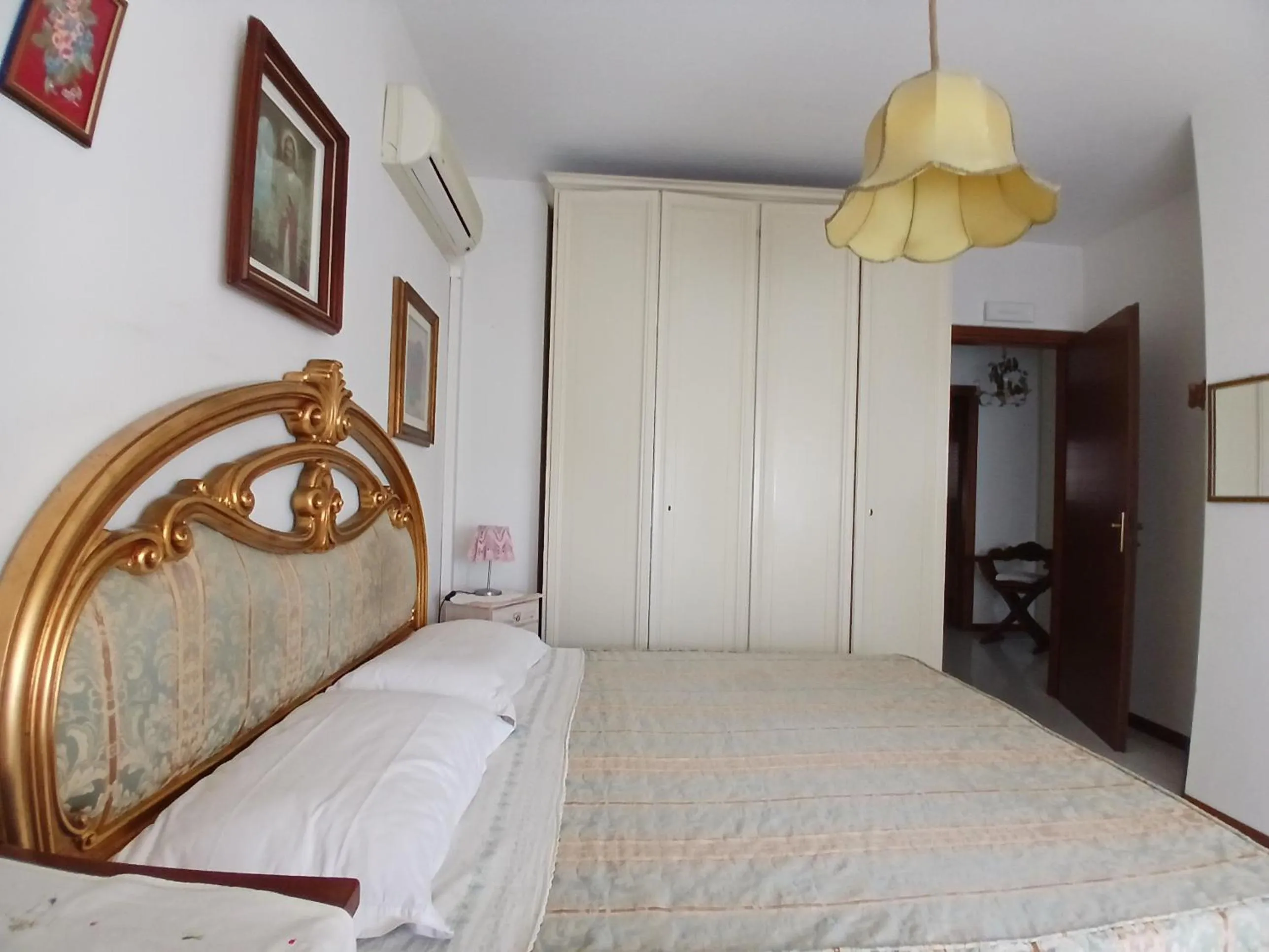 Bed in Il Melograno B&B with private bathrooms