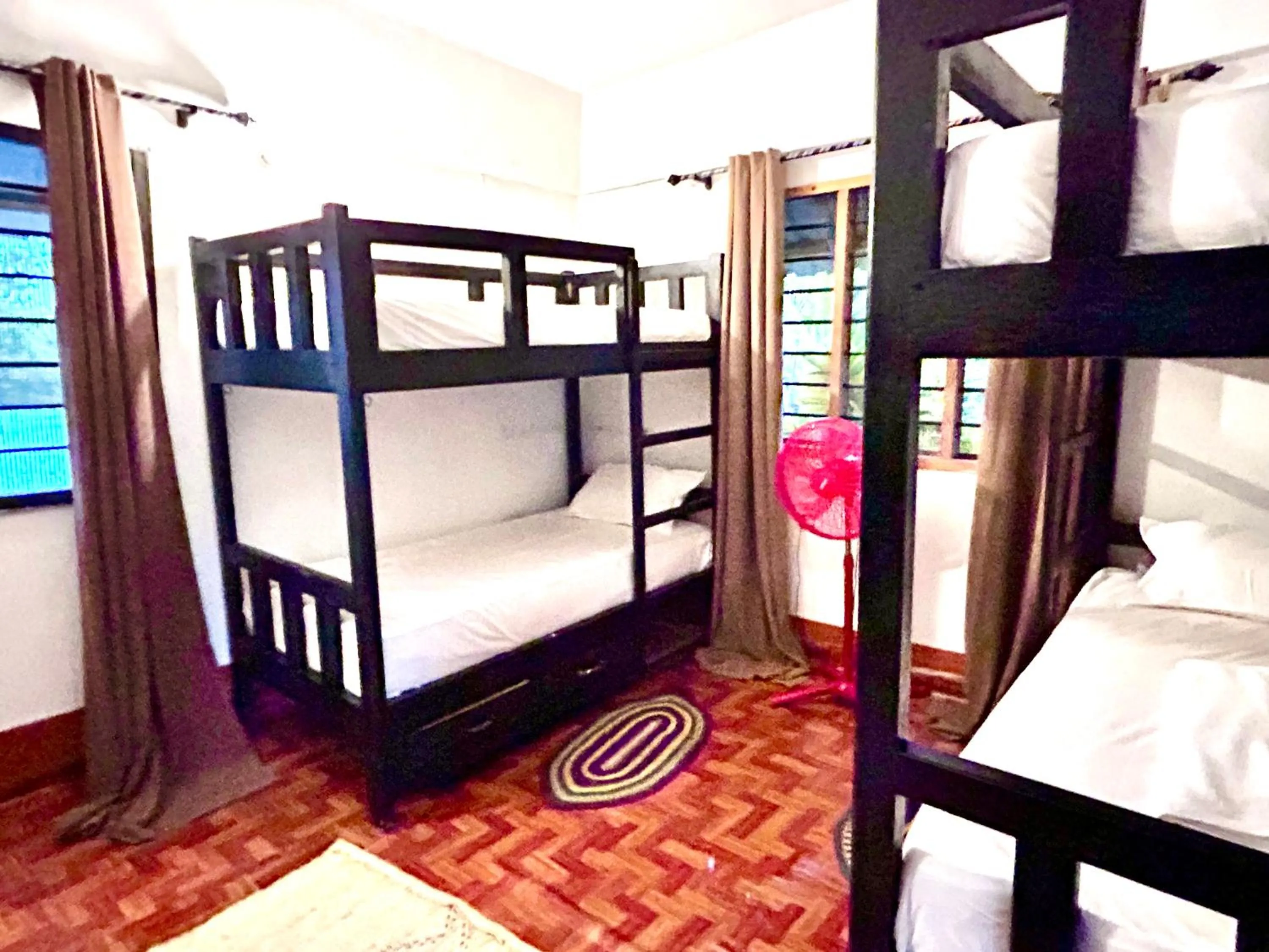 Bed in The Tropinest bungalow