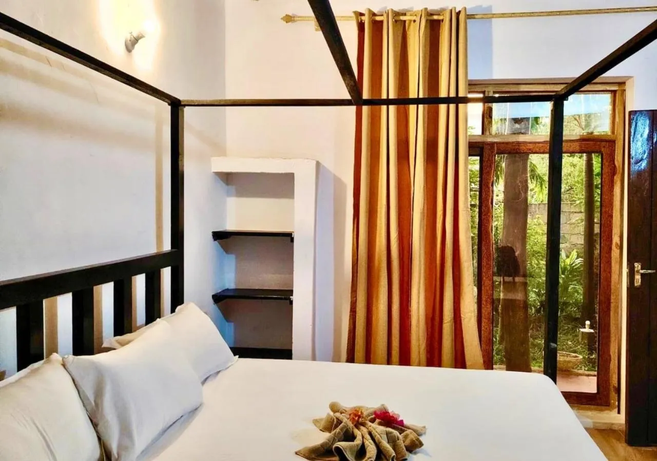 Bed in The Tropinest bungalow