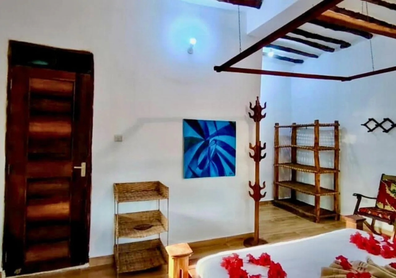 Bed in The Tropinest bungalow