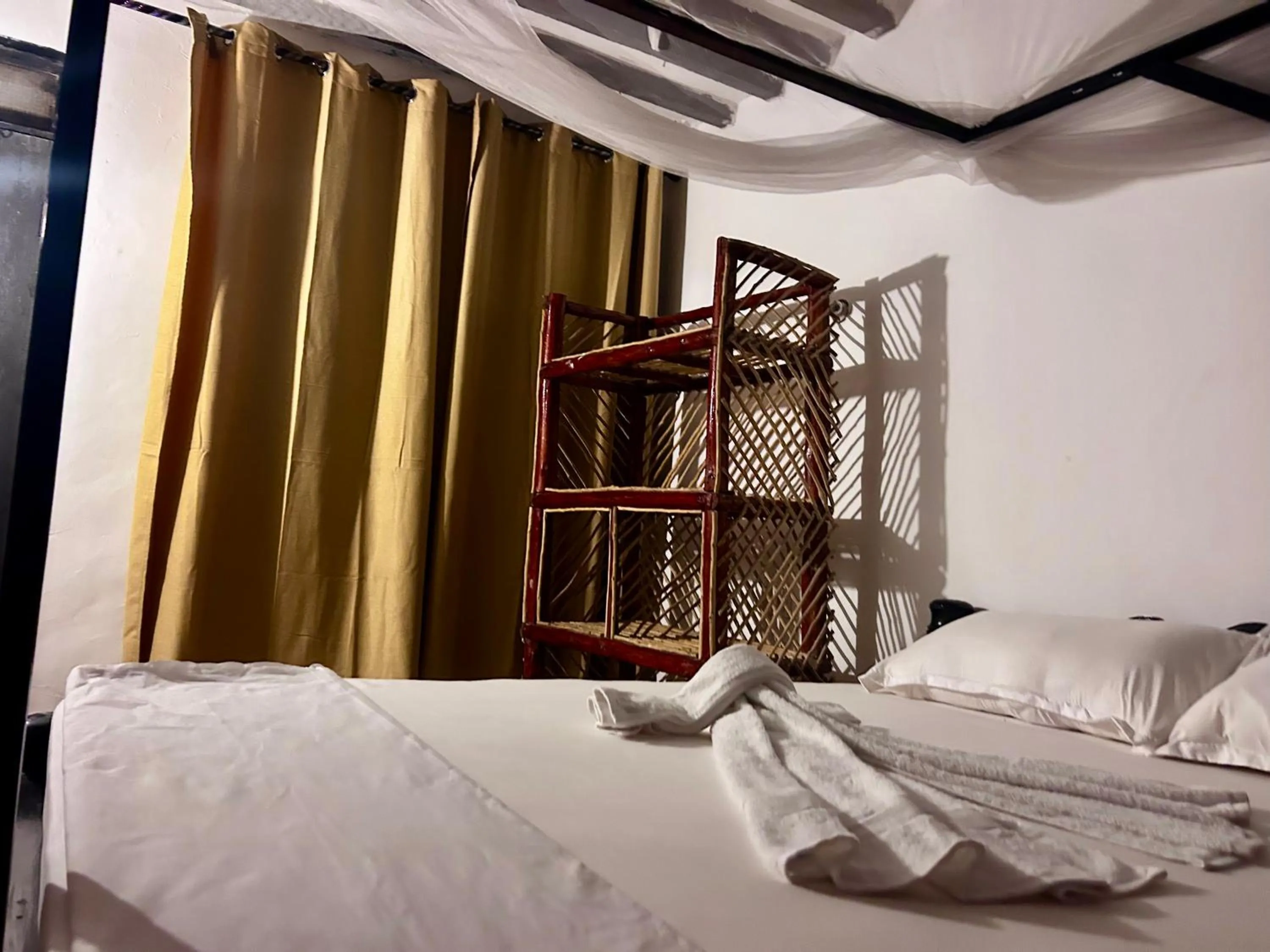 Bed in The Tropinest bungalow