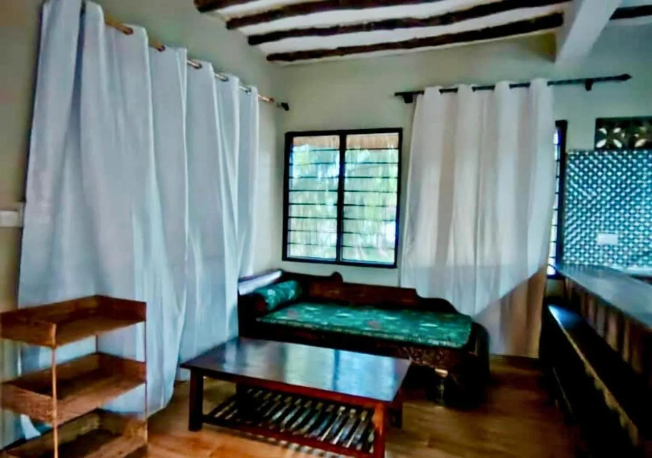 Bed in The Tropinest bungalow