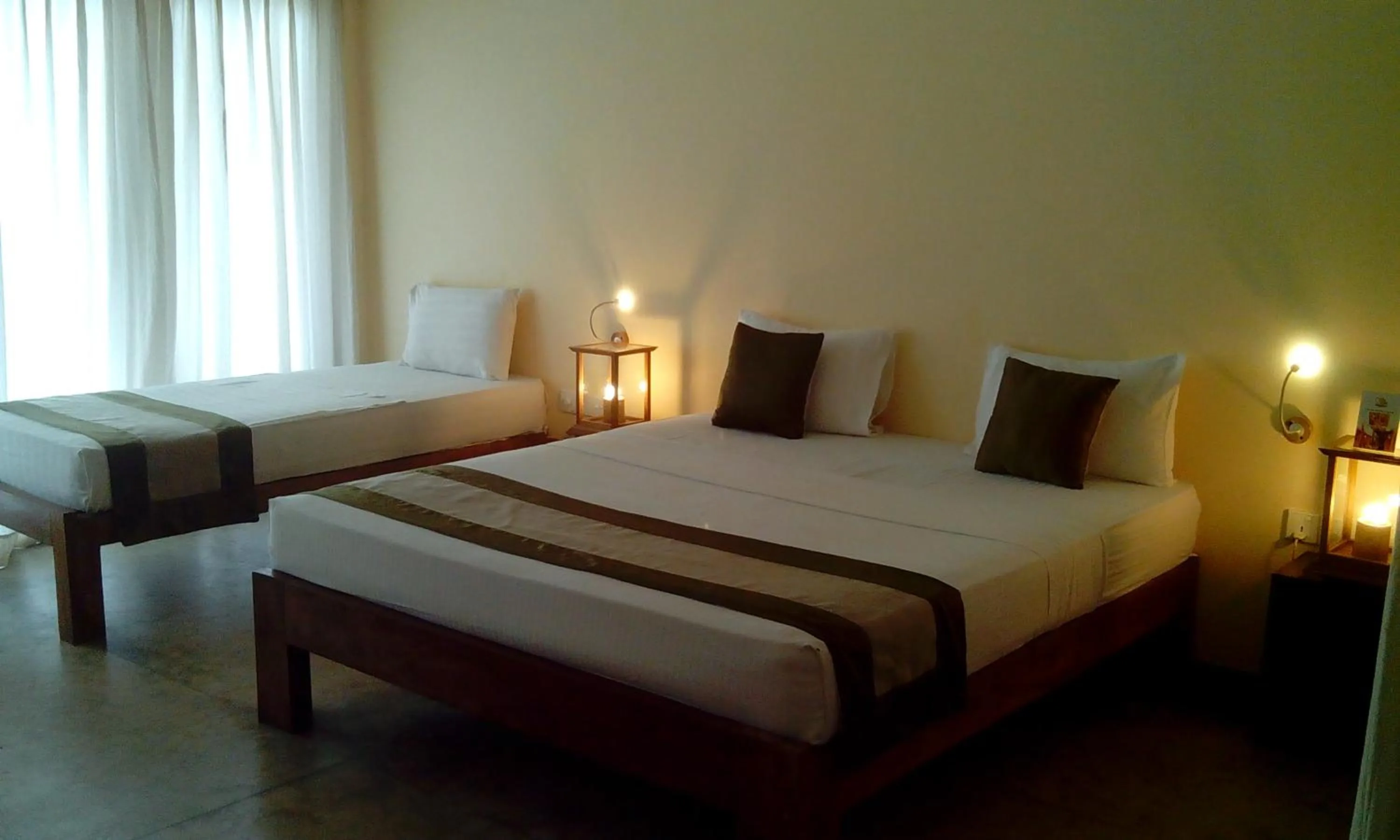 Photo of the whole room, Bed in Giman Free Beach Resort Pasikuda