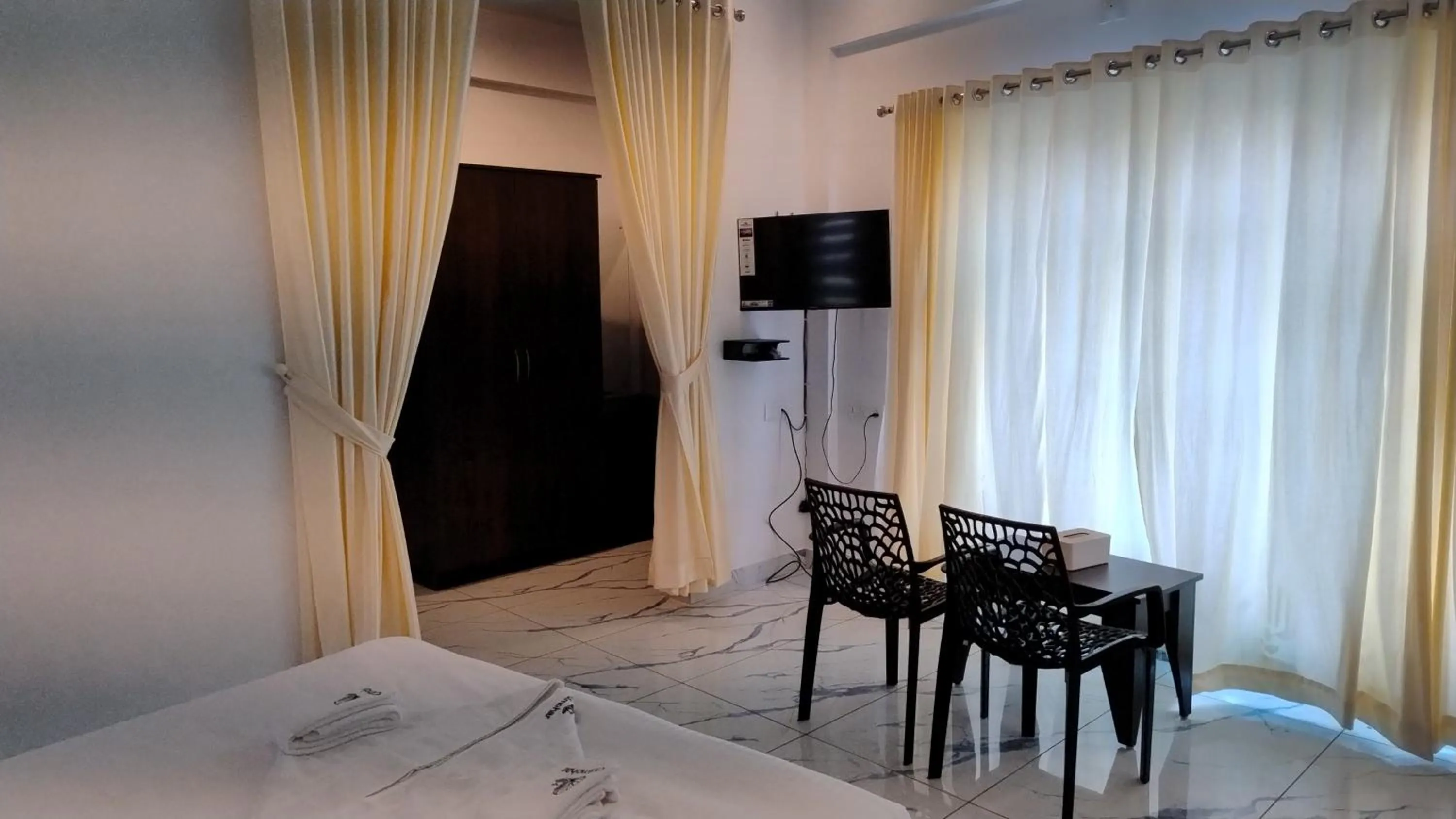 Bed in Gulmohar Varkala