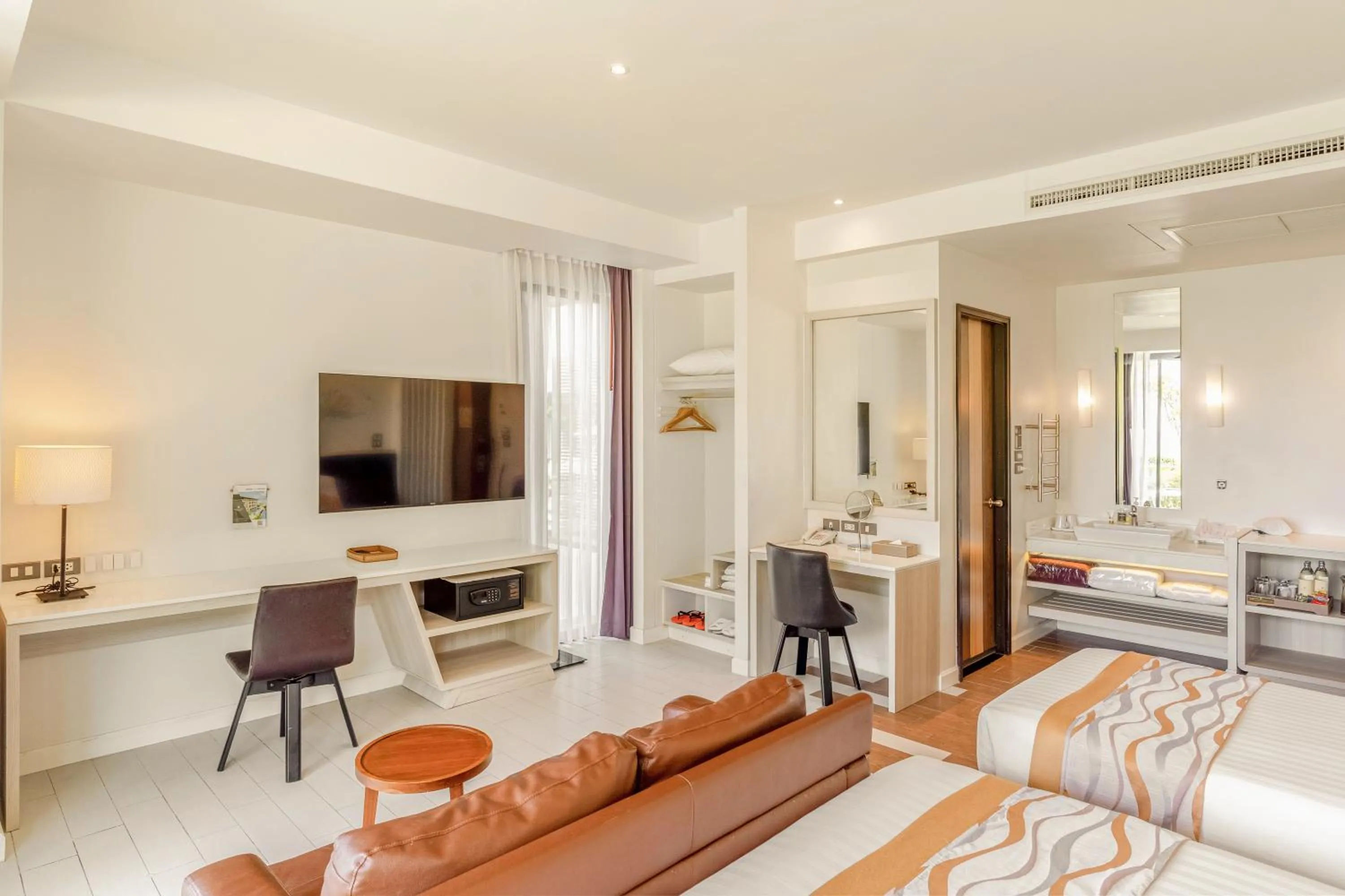 TV and multimedia in Sand Dunes Chaolao Beach Resort