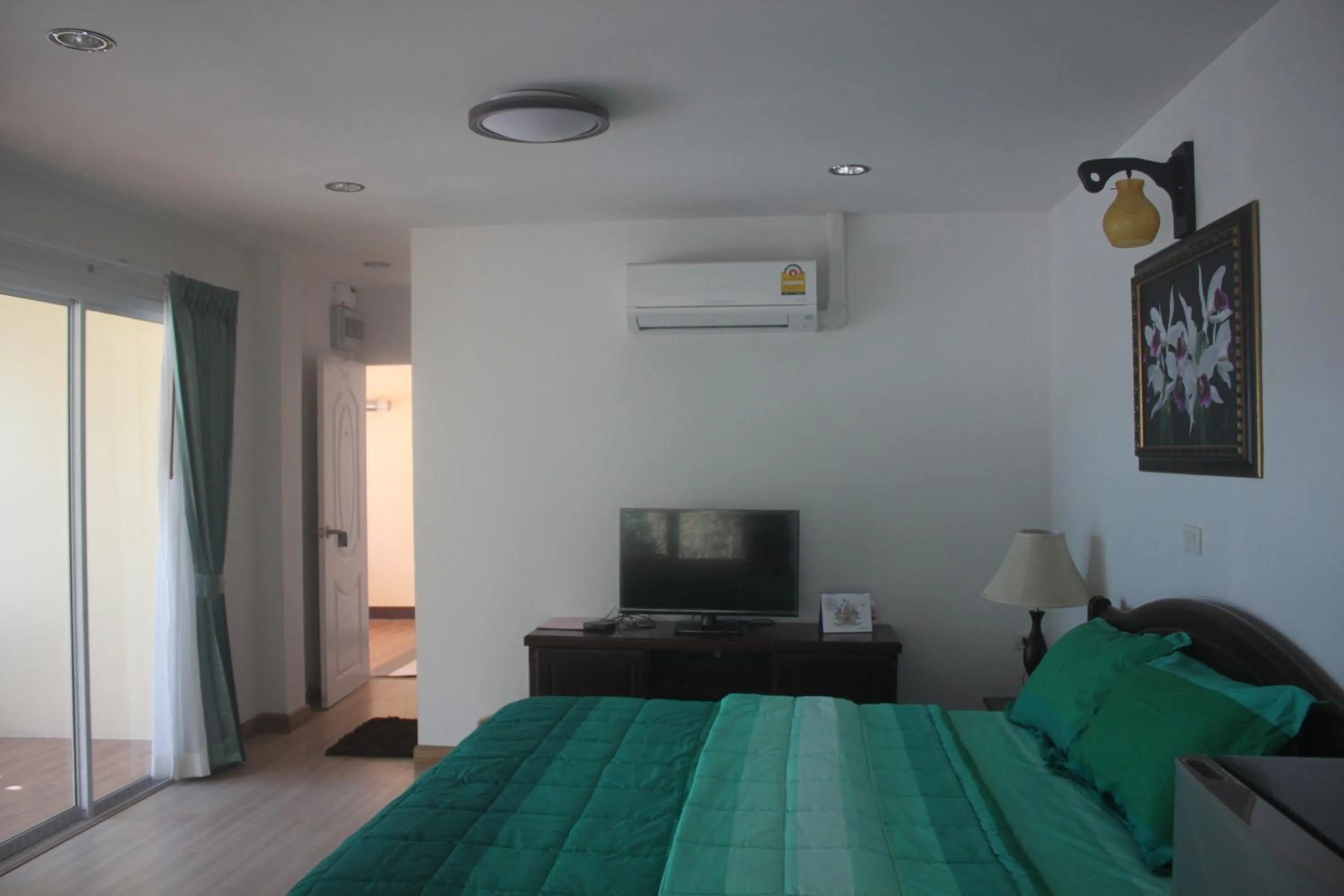 Photo of the whole room, Bed in Nong Nuey Rooms