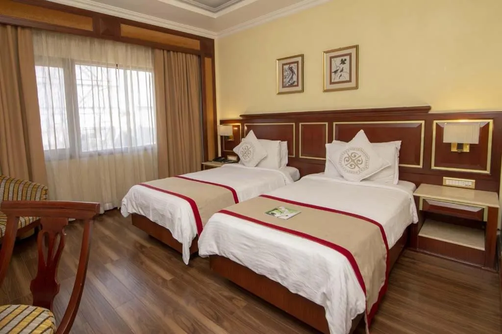 Bed in Hotel Dynasty