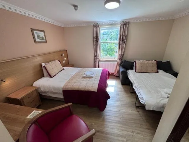 Bed in Cumberland Hotel