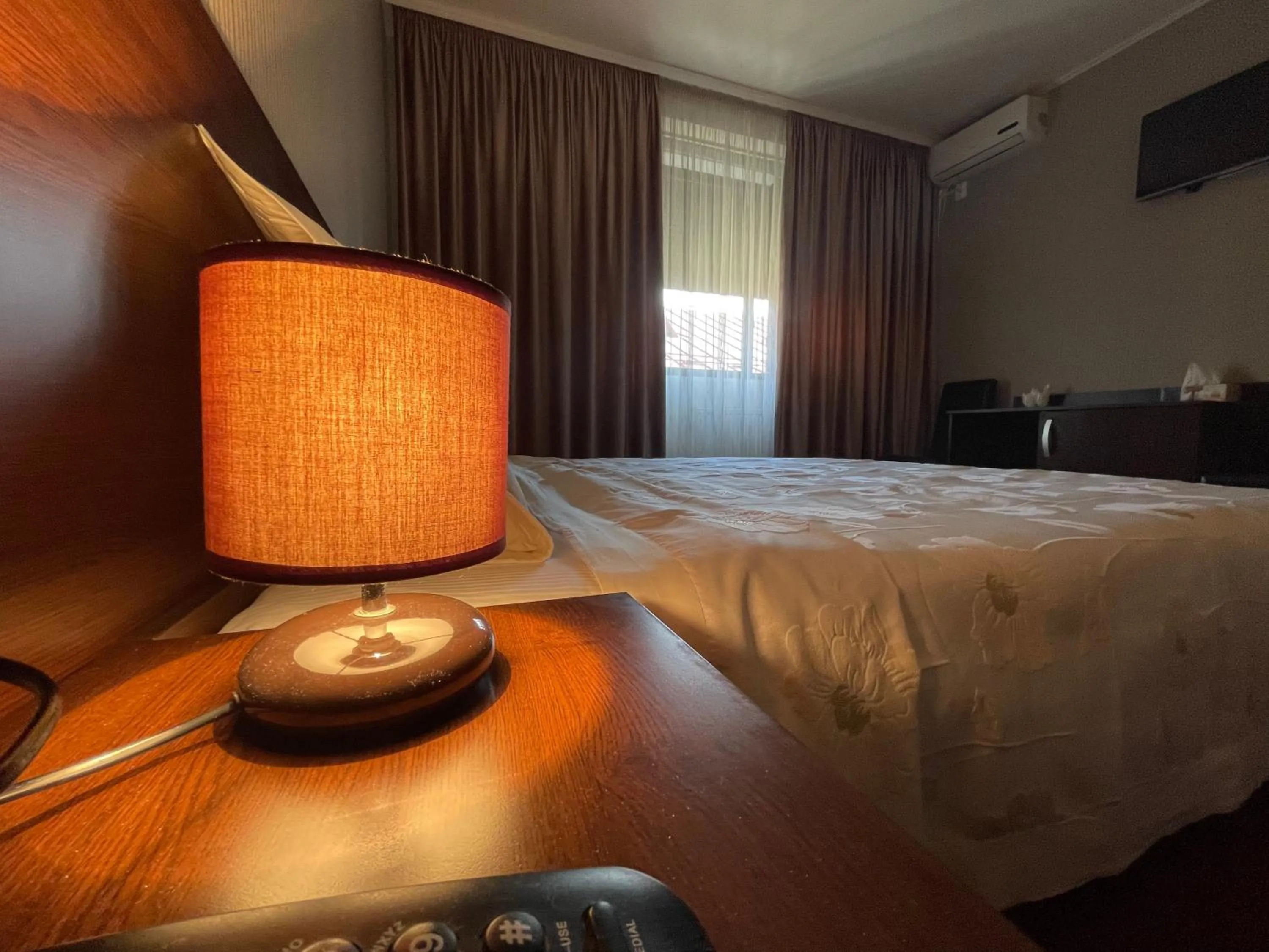 Toilet, Bed in Hotel Athos