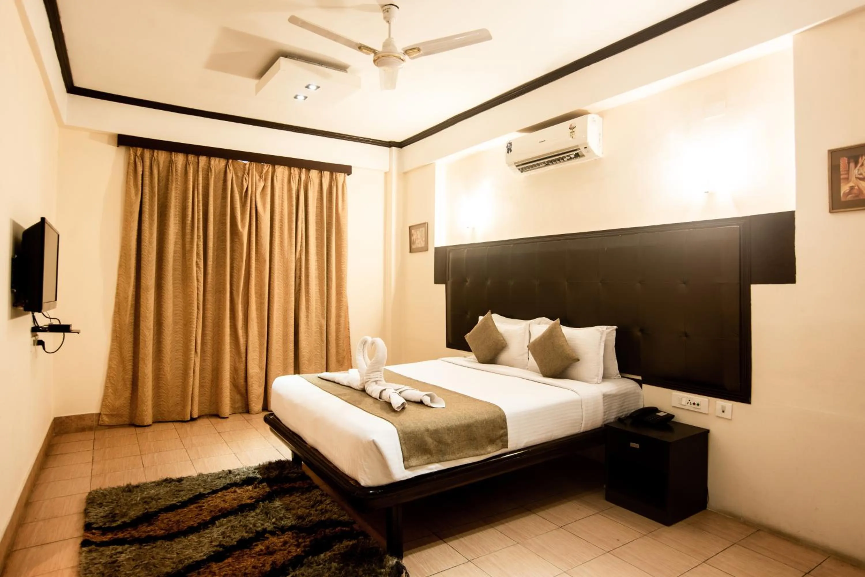 Bed in Polo Tura Hotel