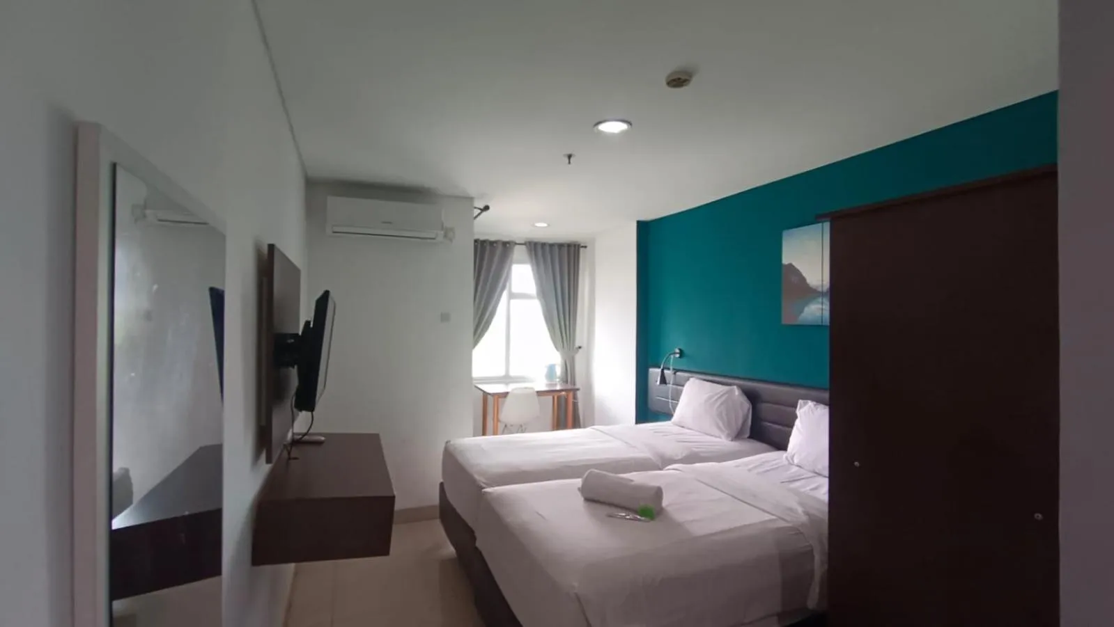 Bed in Izi Cozi Kemayoran Powered by Archipelago