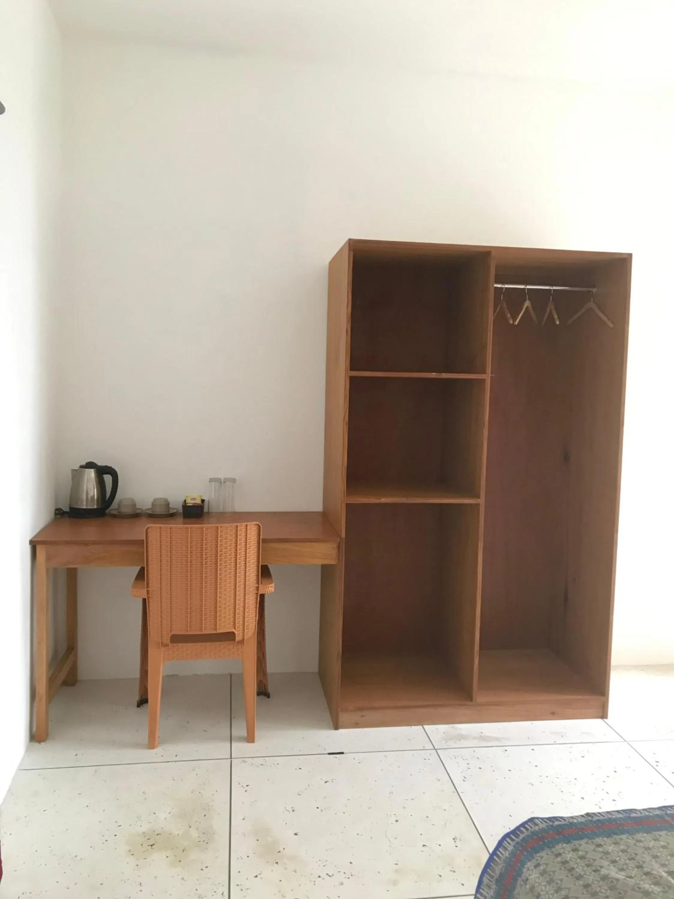 wardrobe in Palmhouse Boutique Hotel