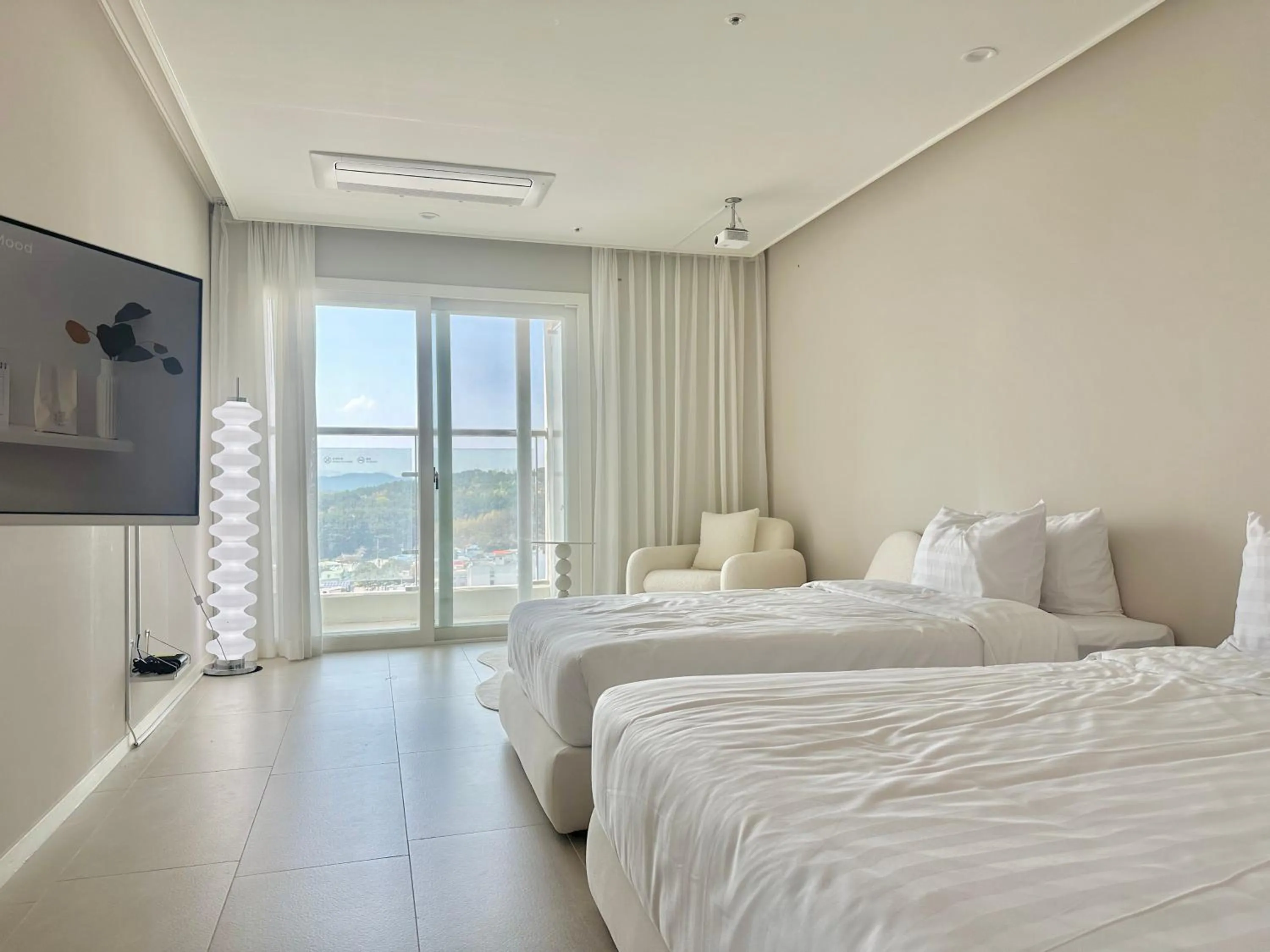 Bed in Le Bleu Naksan by Orot