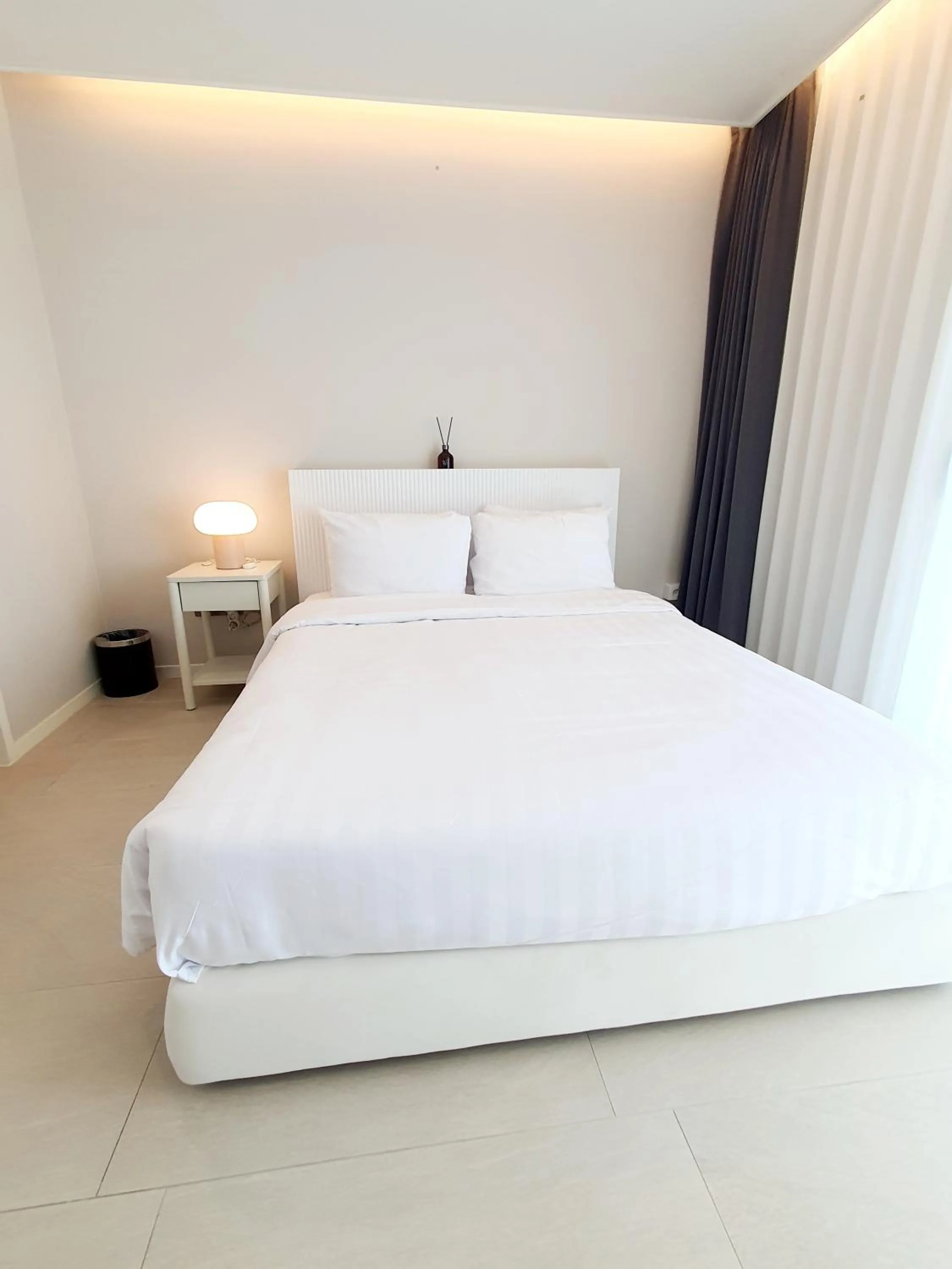 Bed in Le Bleu Naksan by Orot