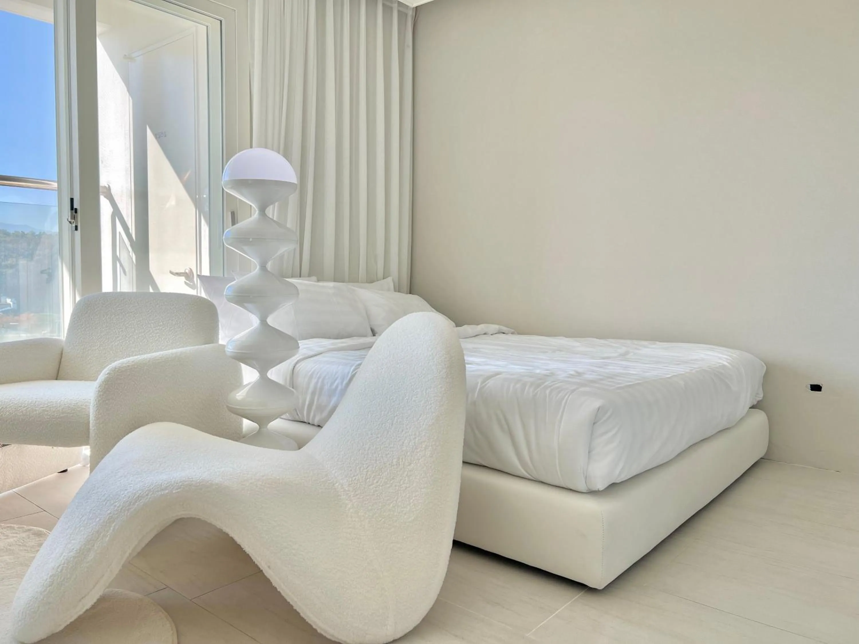 Bed in Le Bleu Naksan by Orot