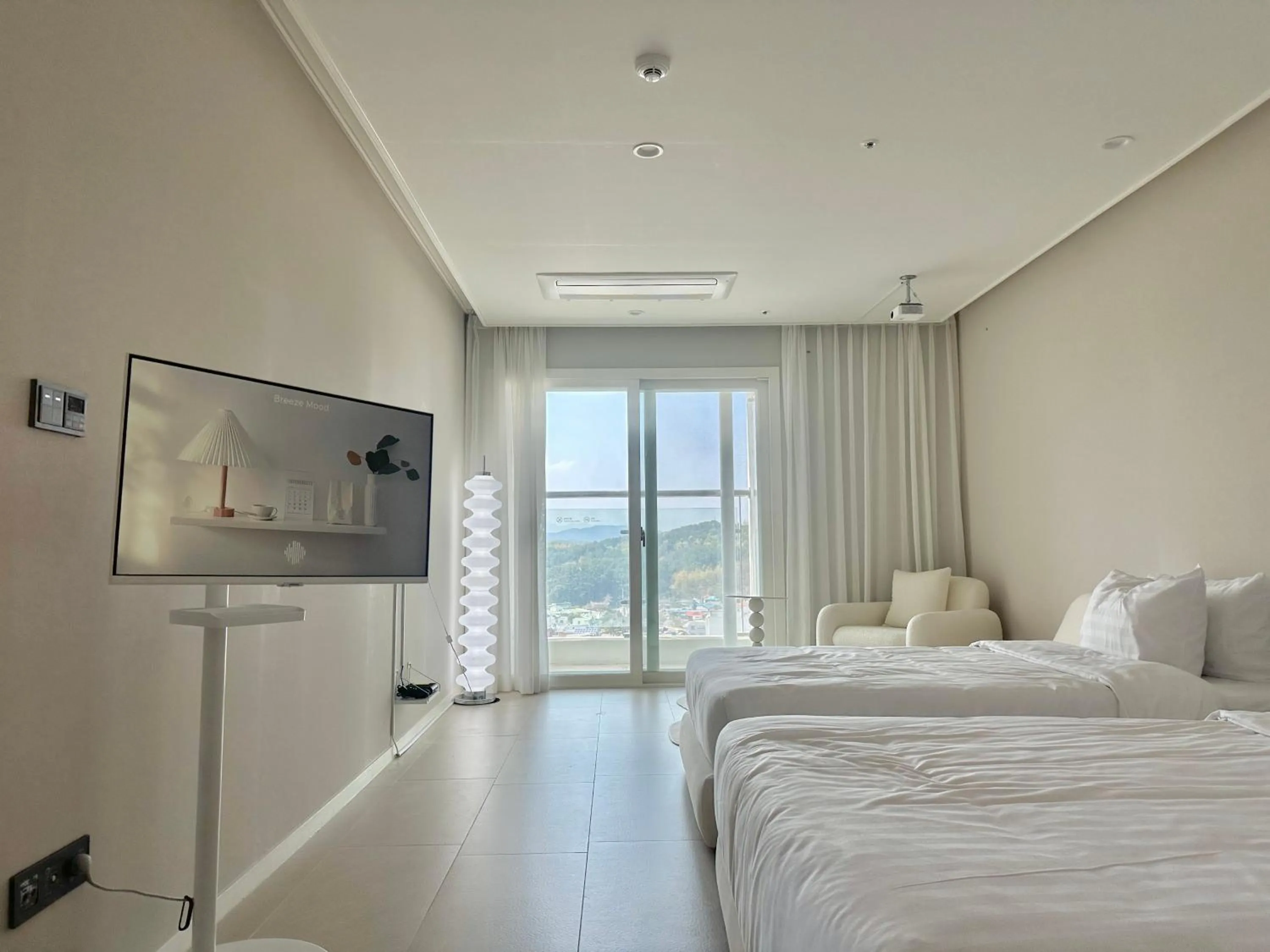 Bed in Le Bleu Naksan by Orot