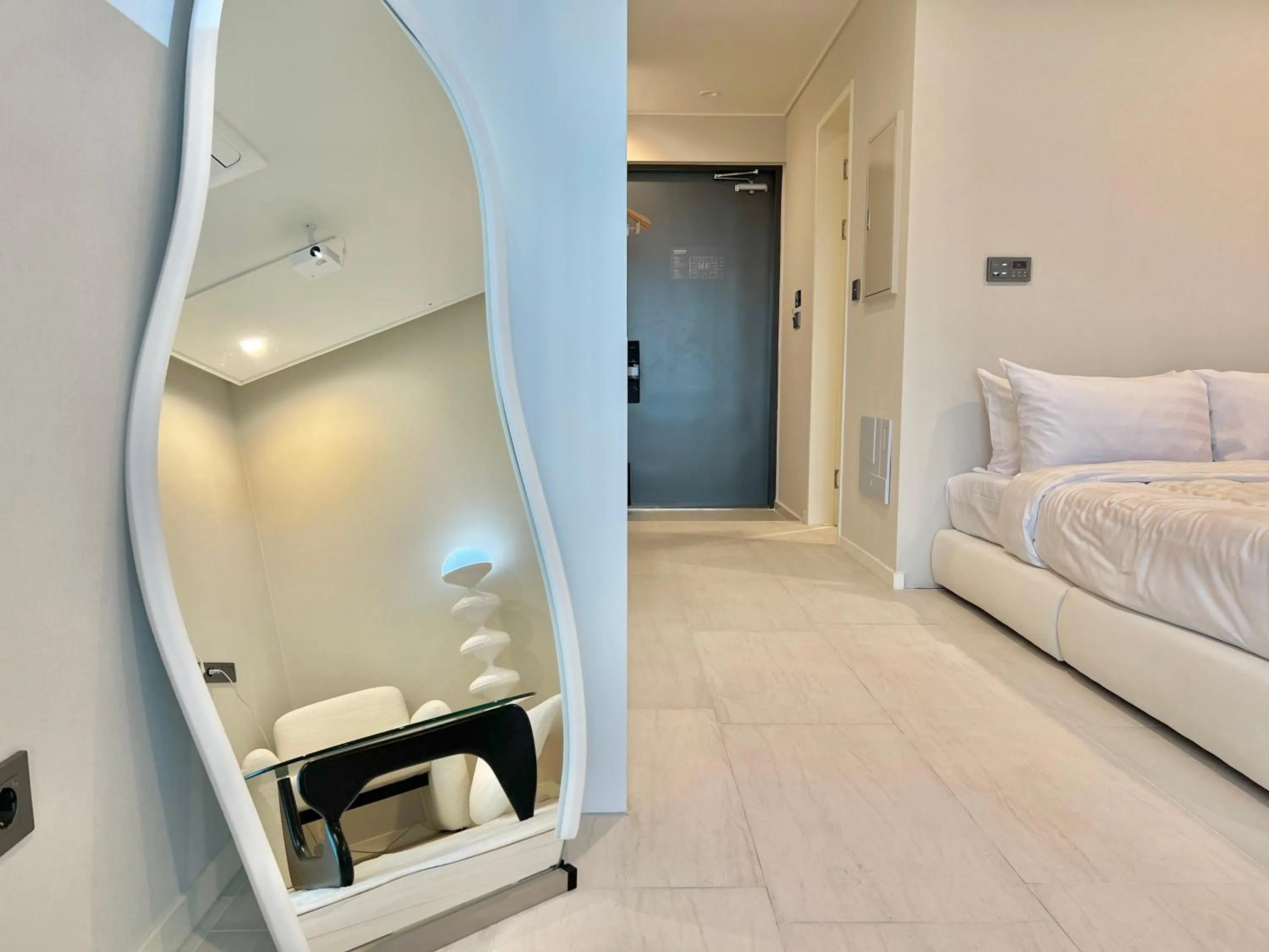 Bed in Le Bleu Naksan by Orot