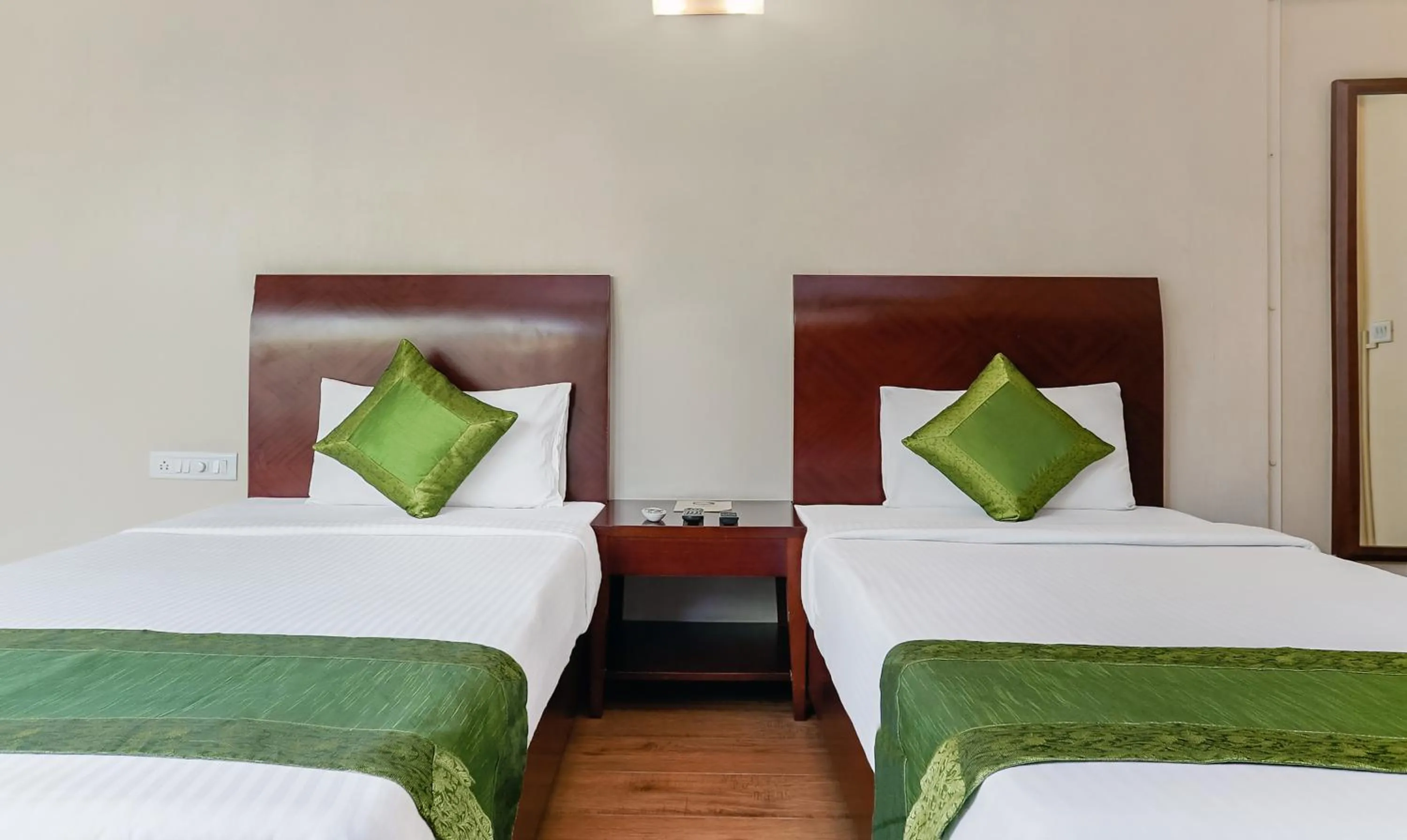 Bedroom, Bed in Treebo Brooks Manor