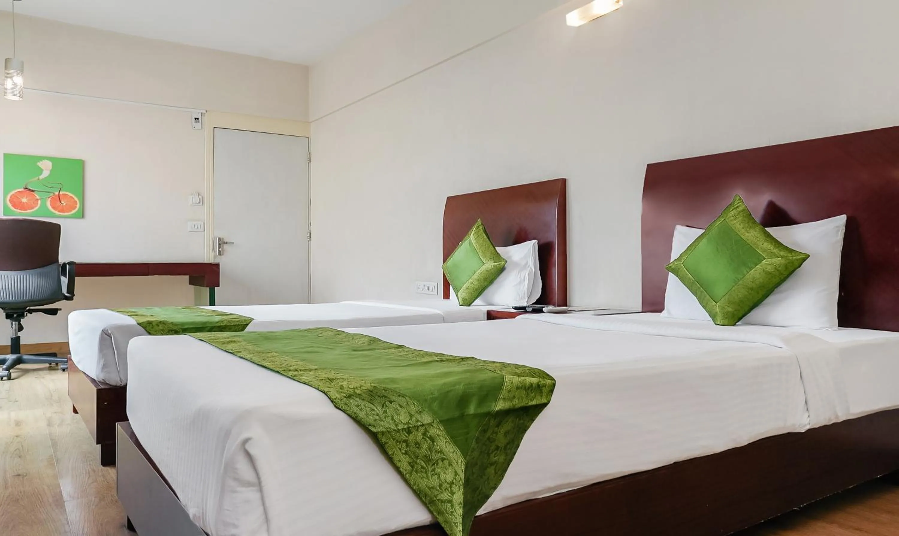 Bedroom, Bed in Treebo Brooks Manor