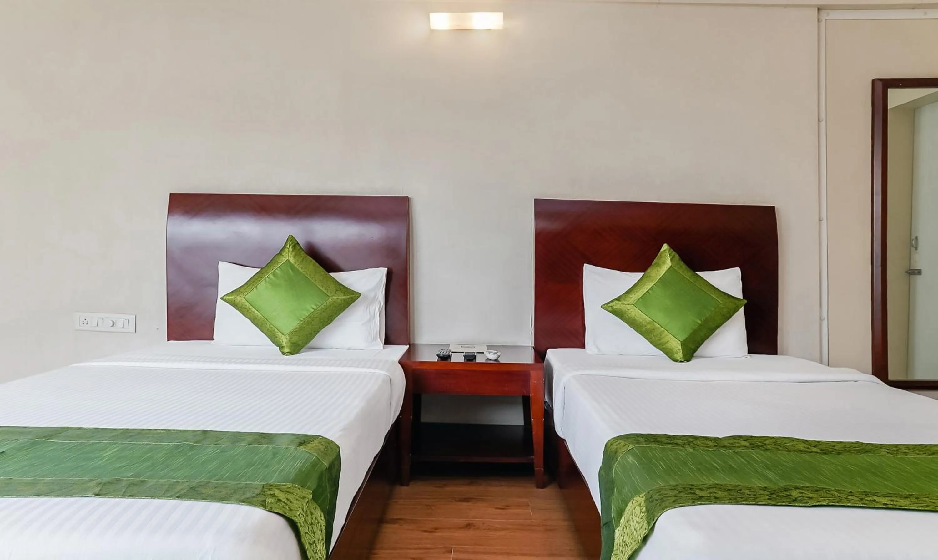 Bedroom, Bed in Treebo Brooks Manor