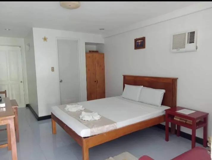 Bed in Sunday flower hotel and beach resort