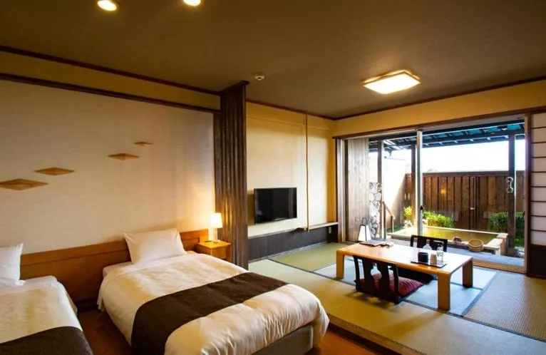 Bed in Senomoto Kogen Hotel