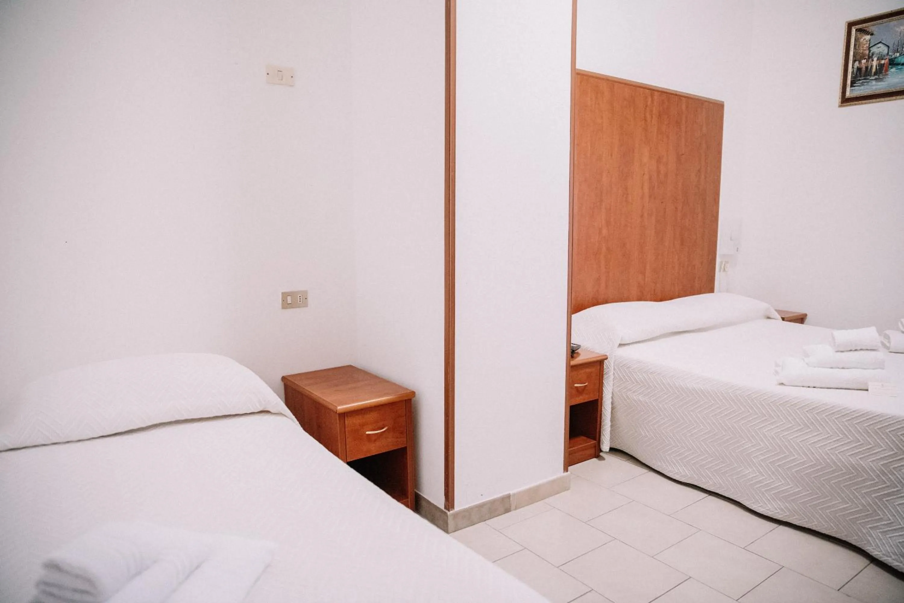 Bed in Magnolia Hotel Vieste