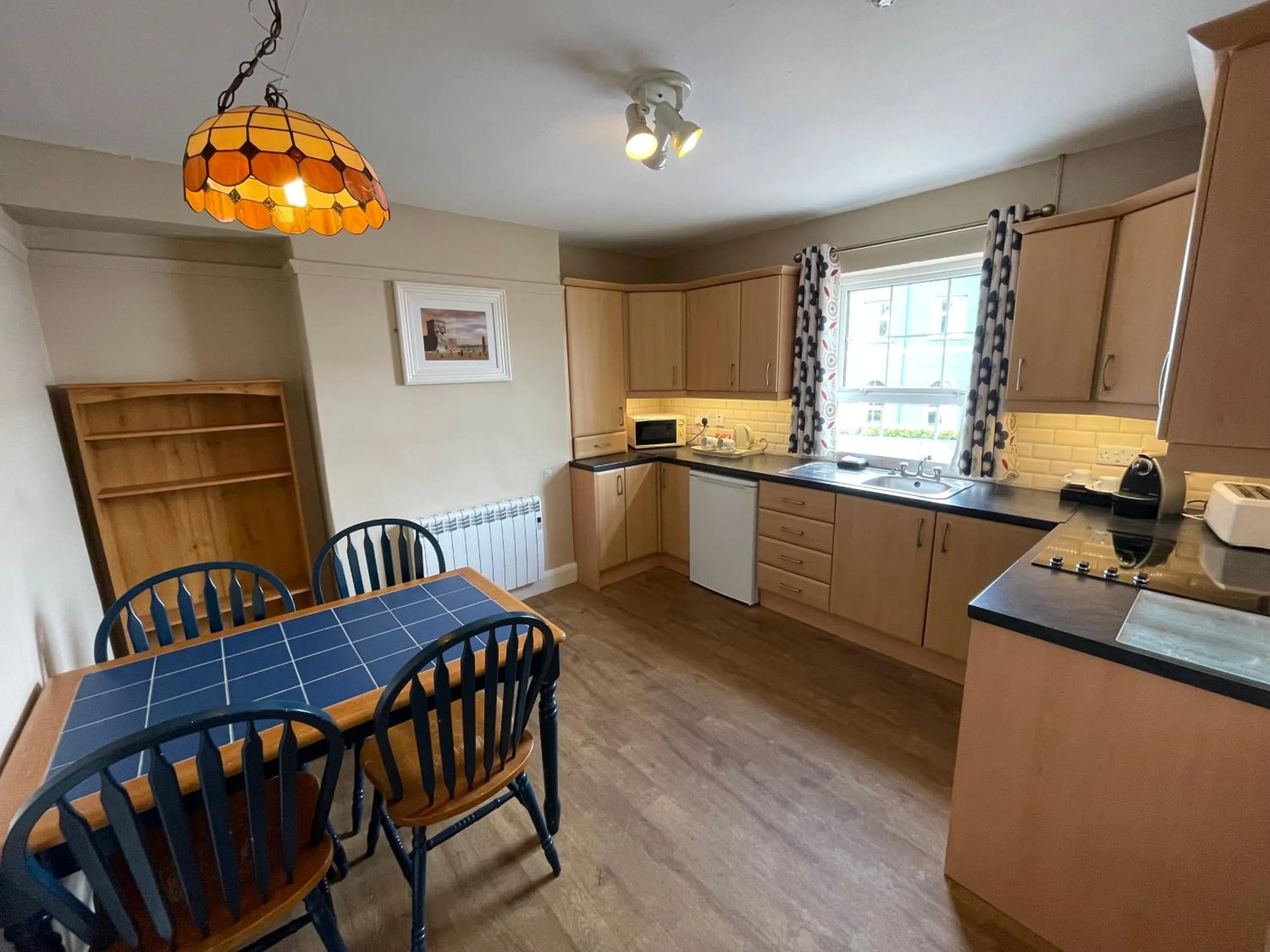 Kitchen or kitchenette in Belmore Court & Motel